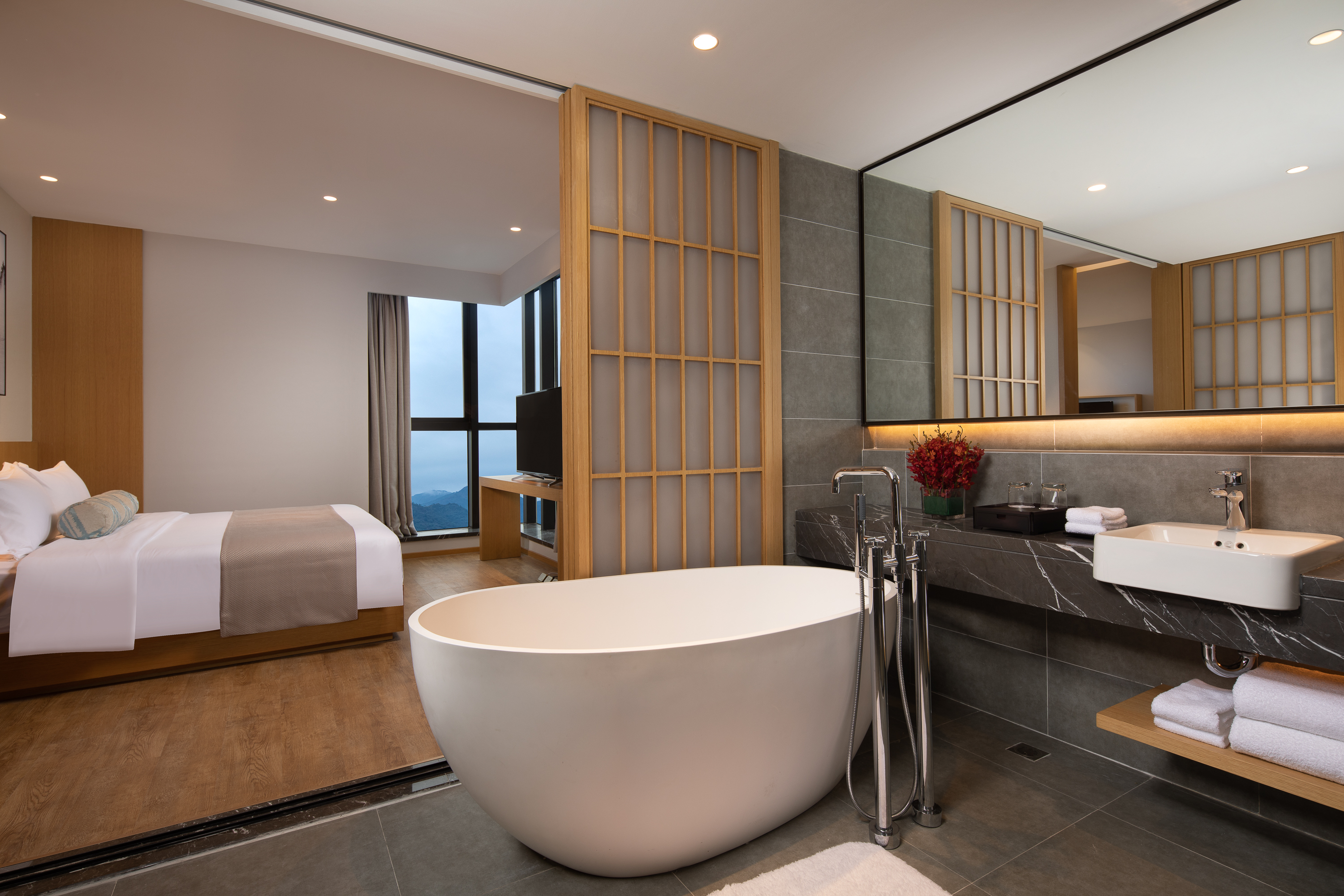 Guest room at the Ramada Plaza by Wyndham Wenzhou Cangnan in Wenzhou, Other than US/Canada