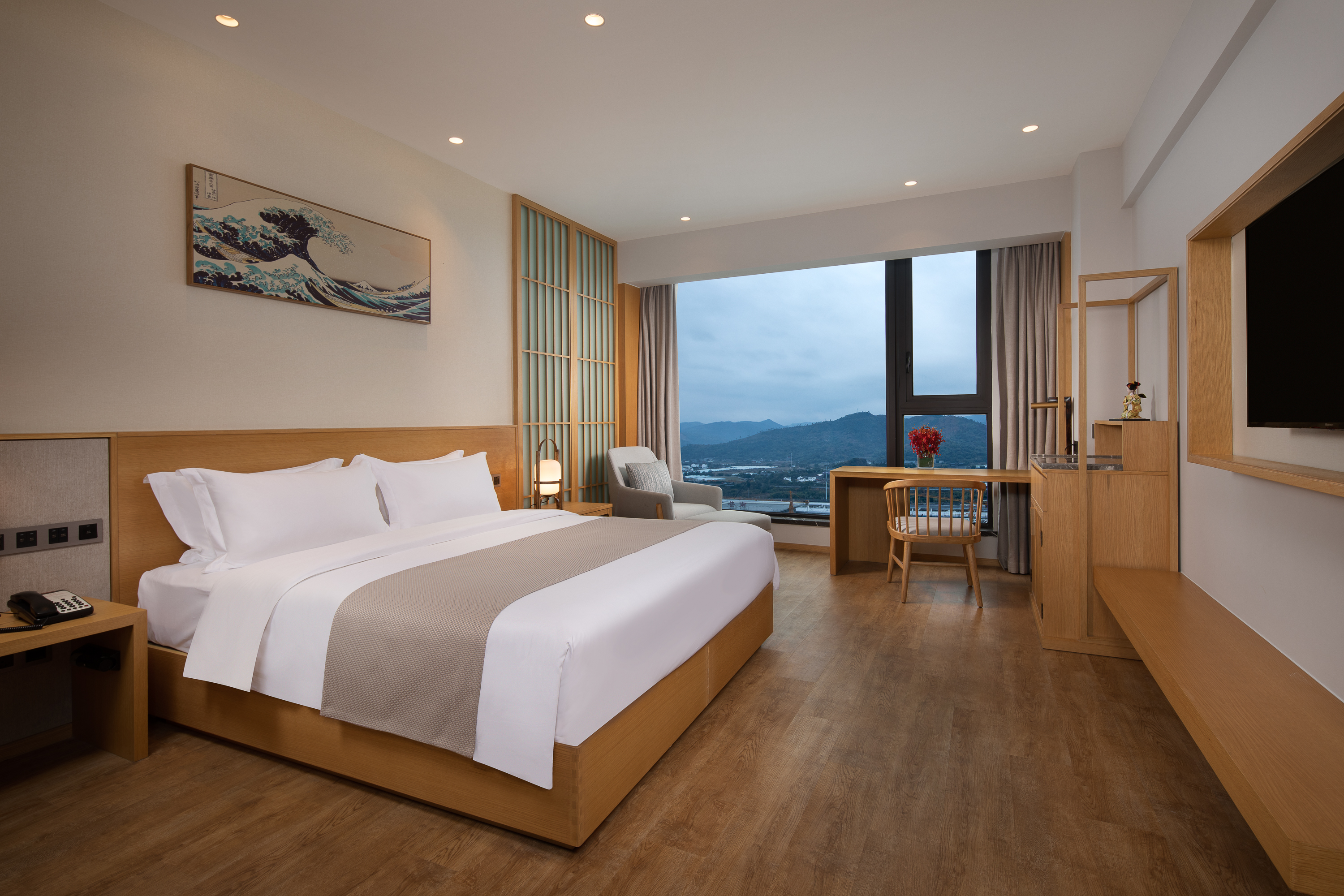 Guest room at the Ramada Plaza by Wyndham Wenzhou Cangnan in Wenzhou, Other than US/Canada