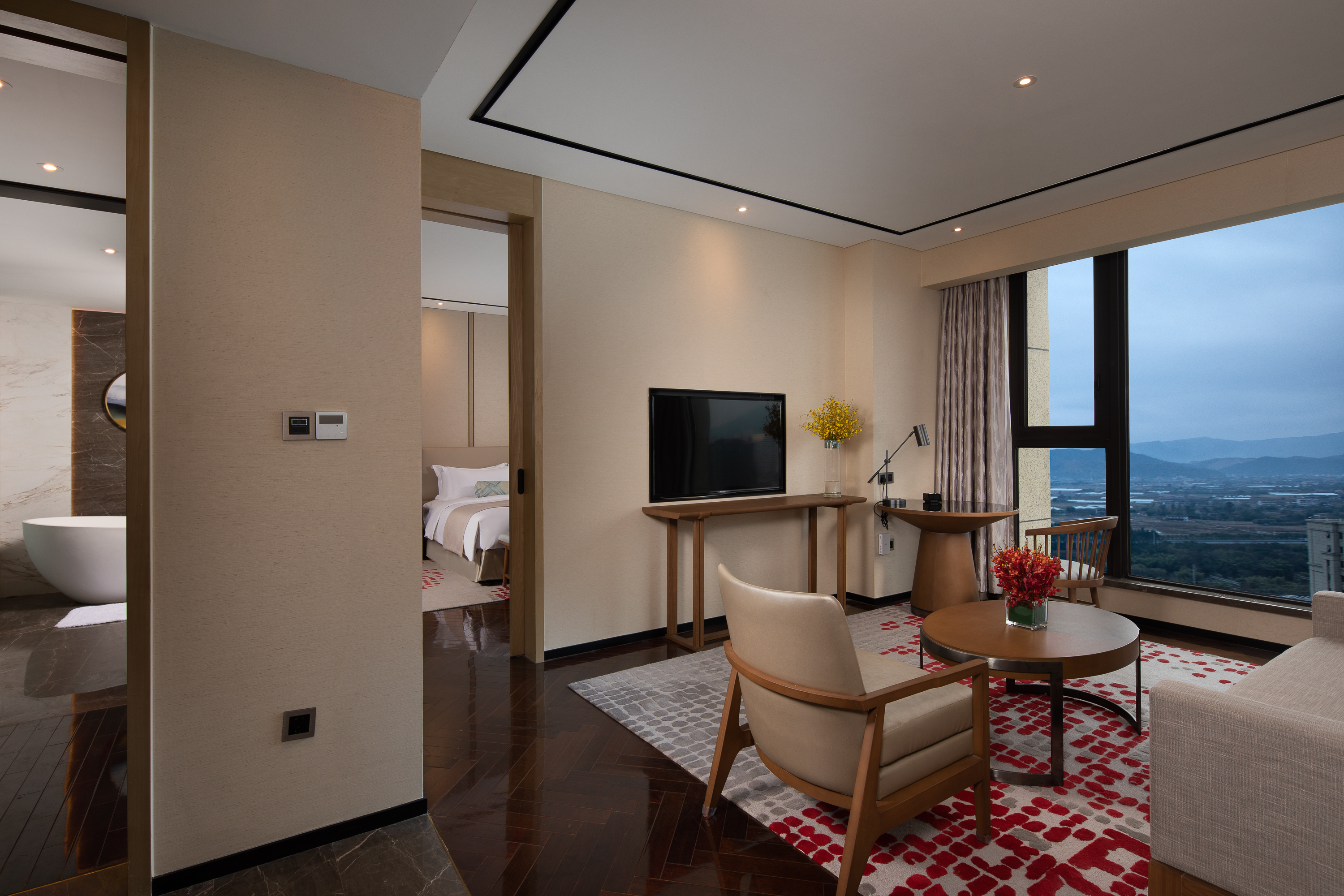 Guest room at the Ramada Plaza by Wyndham Wenzhou Cangnan in Wenzhou, Other than US/Canada