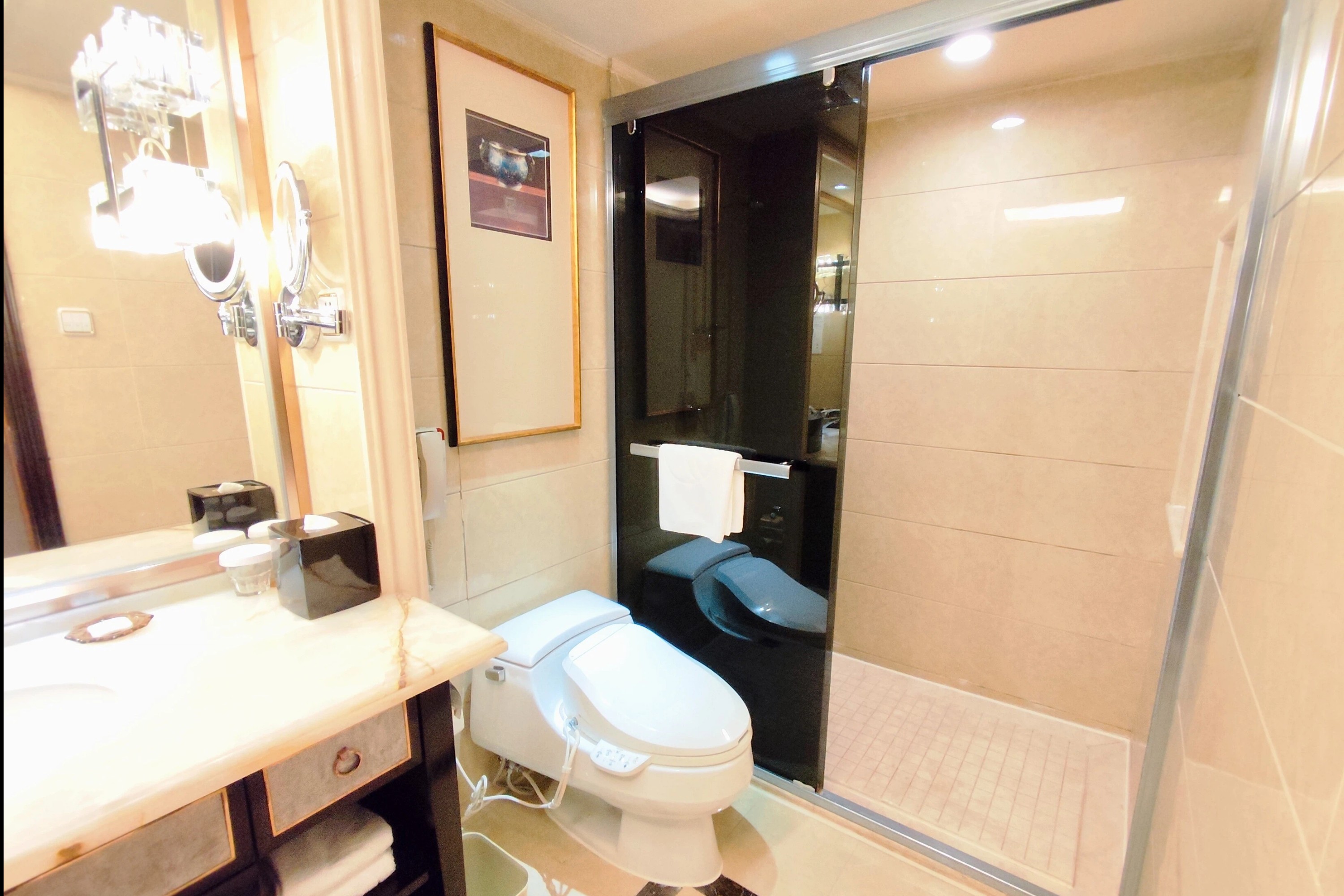 Guest room bath at the Ramada Plaza by Wyndham Tian Lu Hotel Wuhan in Wuhan, Other than US/Canada