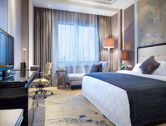 Guest room at the Ramada Plaza by Wyndham Tian Lu Hotel Wuhan in Wuhan, Other than US/Canada