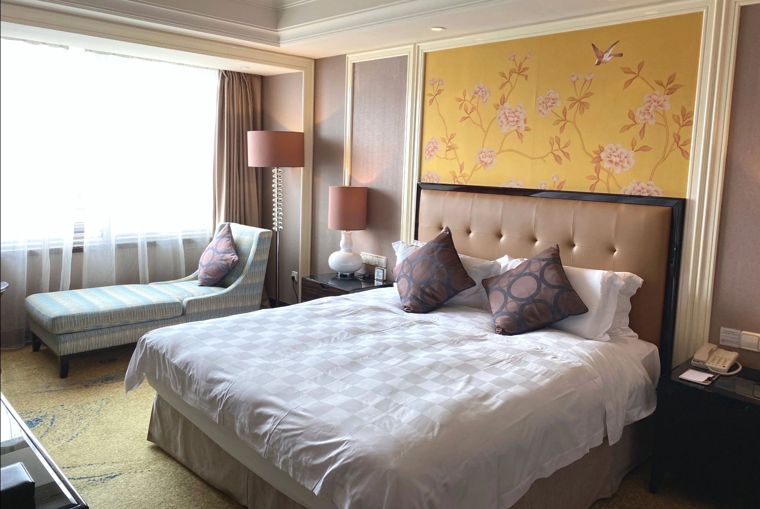Queen bed guest room at the Ramada Plaza by Wyndham Tian Lu Hotel Wuhan in Wuhan, Other than US/Canada