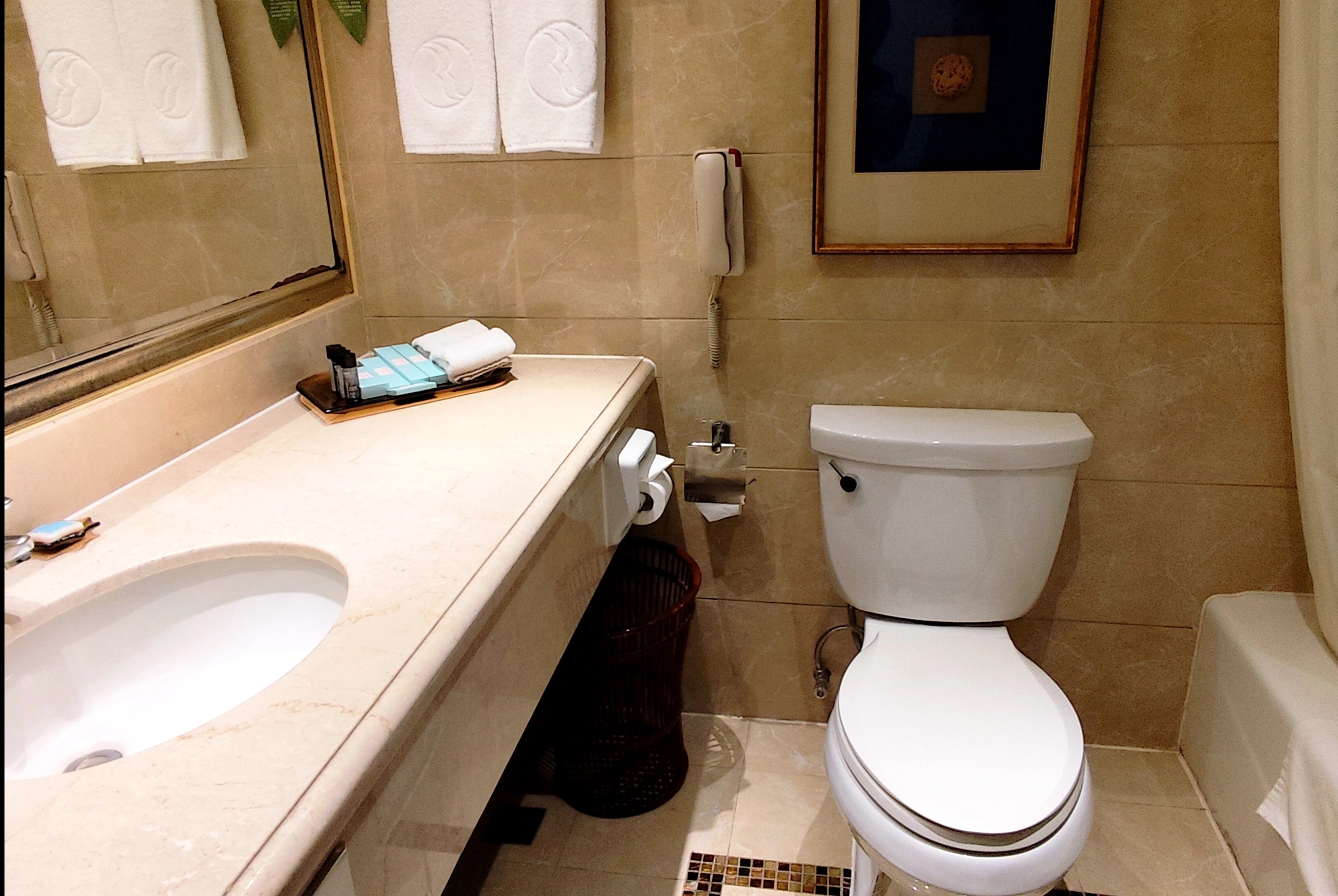 Guest room bath at the Ramada Plaza by Wyndham Tian Lu Hotel Wuhan in Wuhan, Other than US/Canada