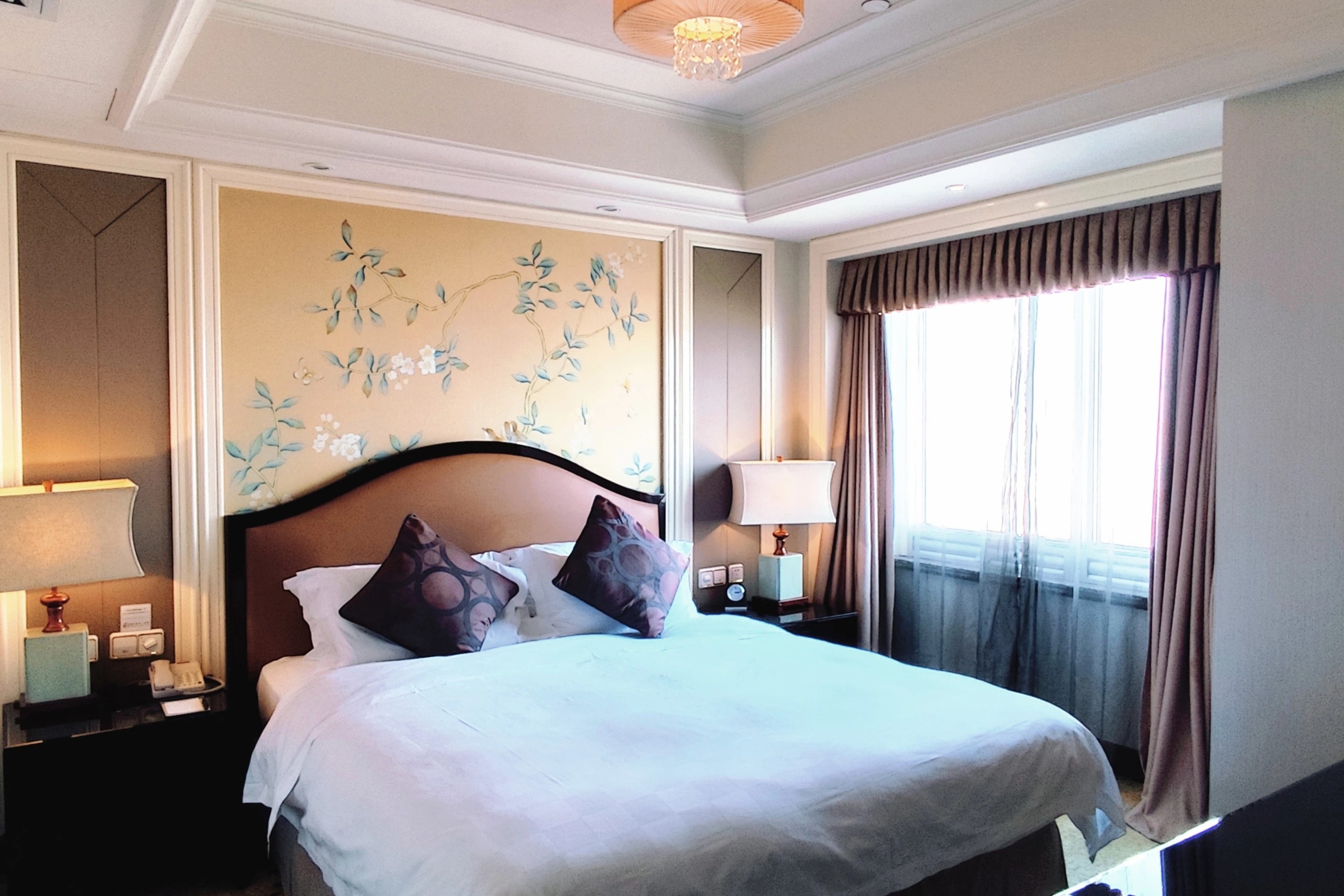 Guest room at the Ramada Plaza by Wyndham Tian Lu Hotel Wuhan in Wuhan, Other than US/Canada