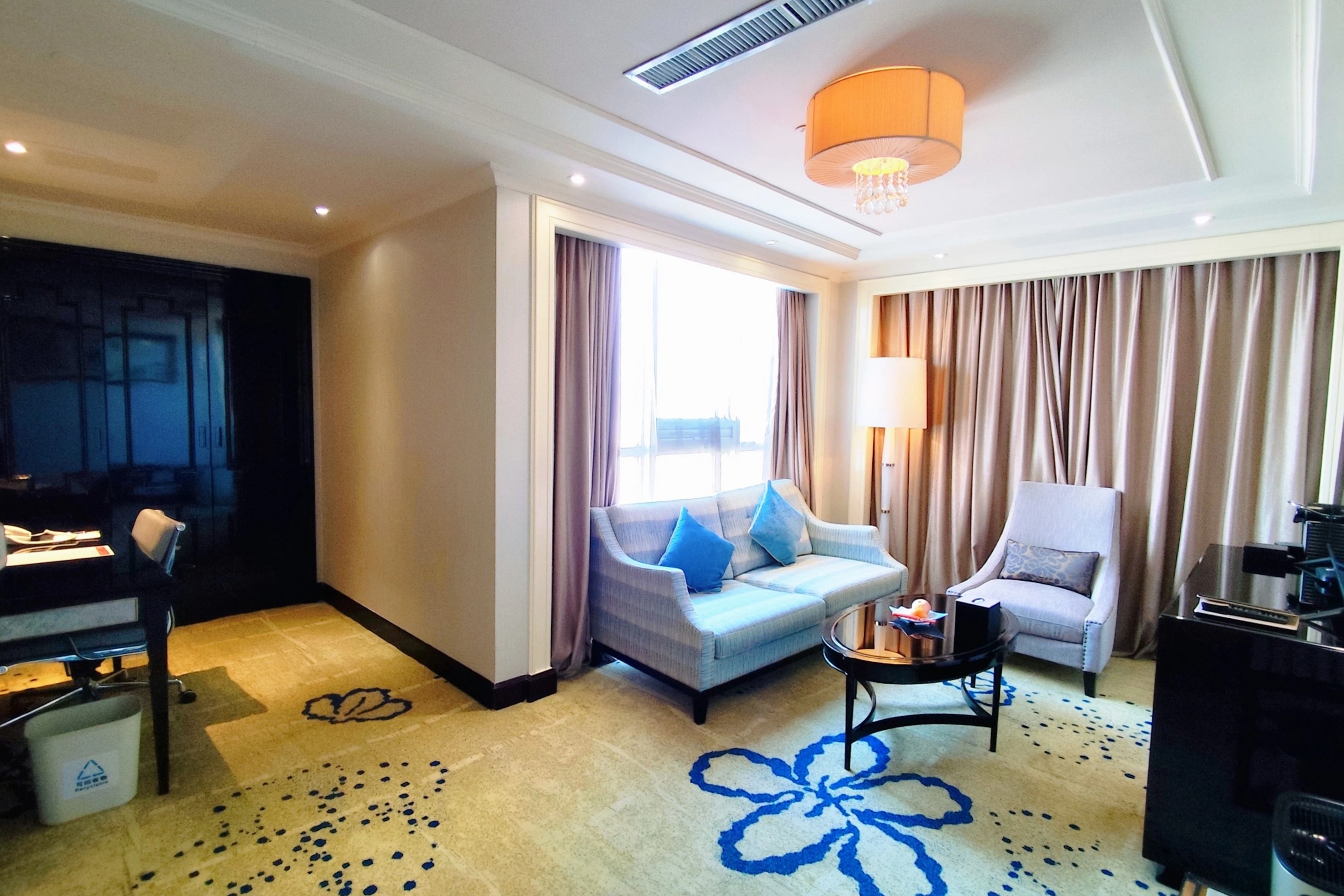 Guest room at the Ramada Plaza by Wyndham Tian Lu Hotel Wuhan in Wuhan, Other than US/Canada