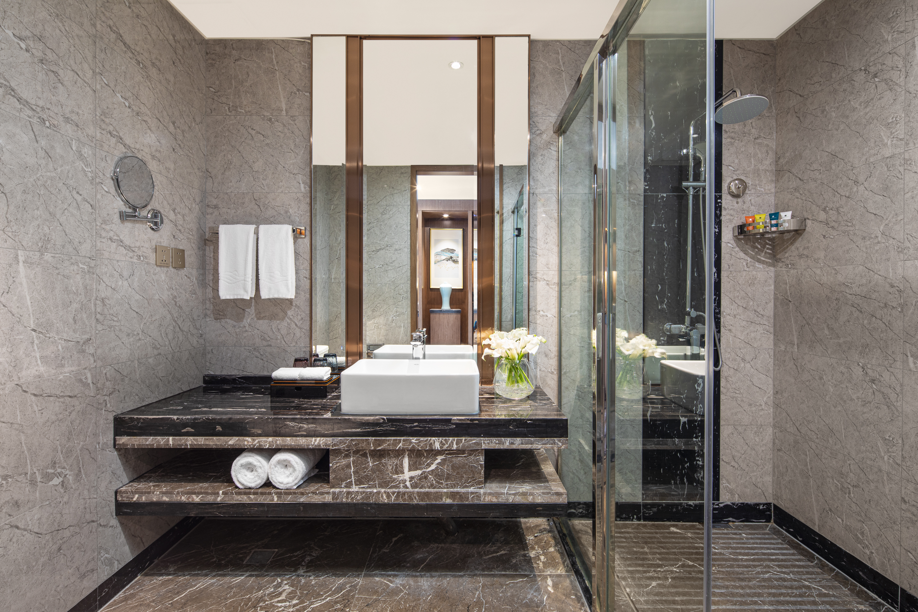 Guest room bath at the Ramada by Wyndham Wuhan Qingshan in Wuhan, Other than US/Canada