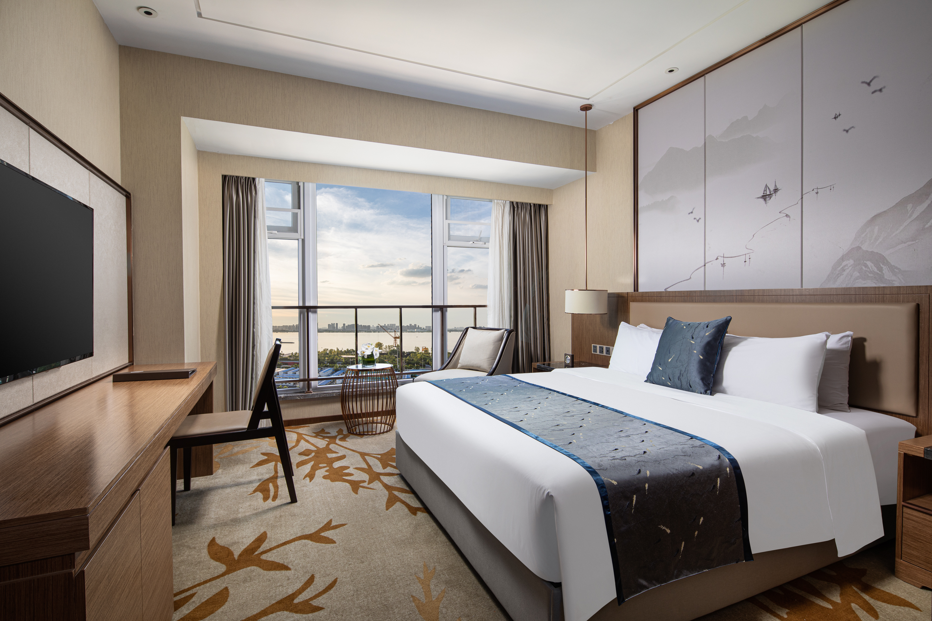 Guest room at the Ramada by Wyndham Wuhan Qingshan in Wuhan, Other than US/Canada