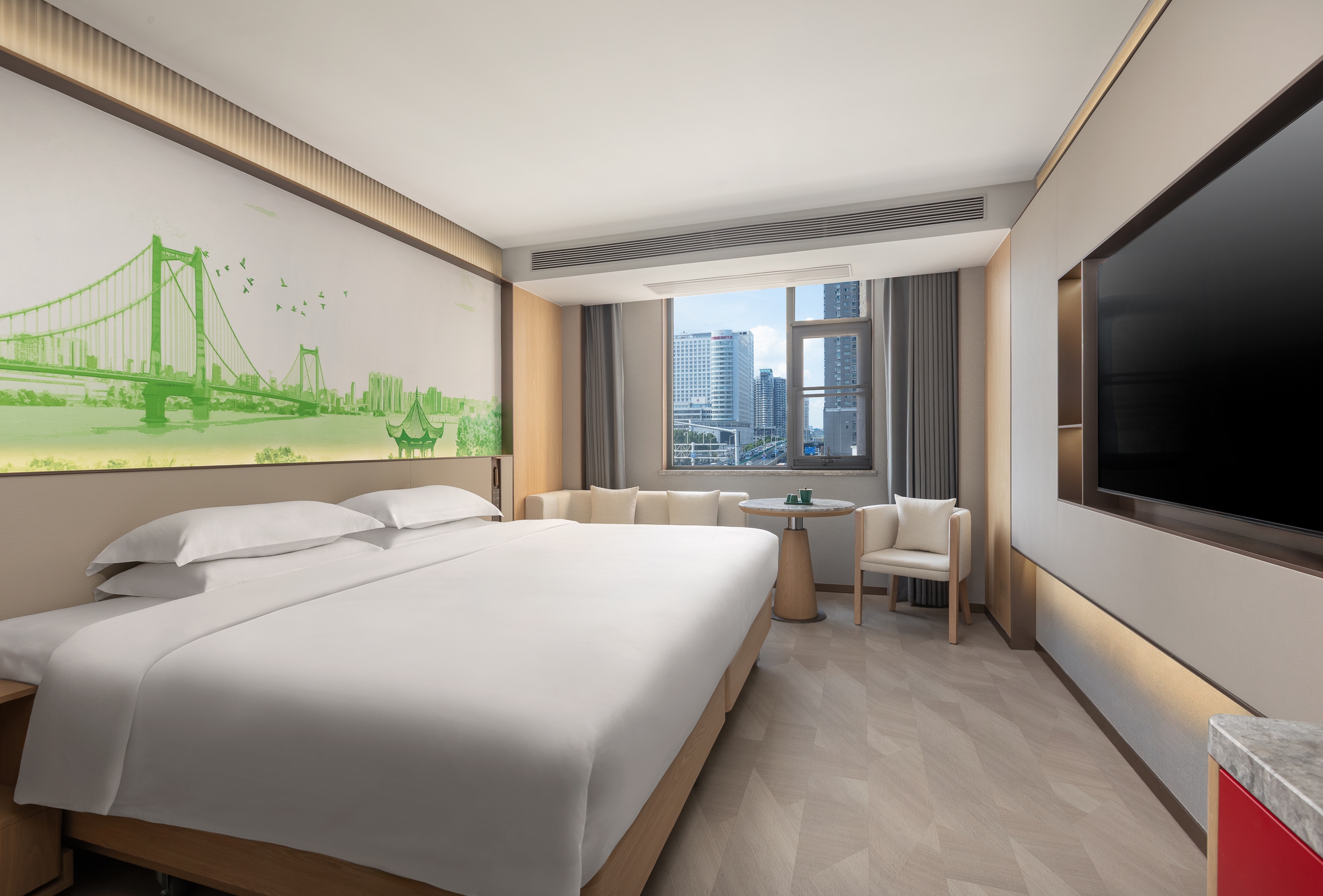 Guest room at the Ramada Encore by Wyndham Wuhan Downtown in Wuhan, Other than US/Canada