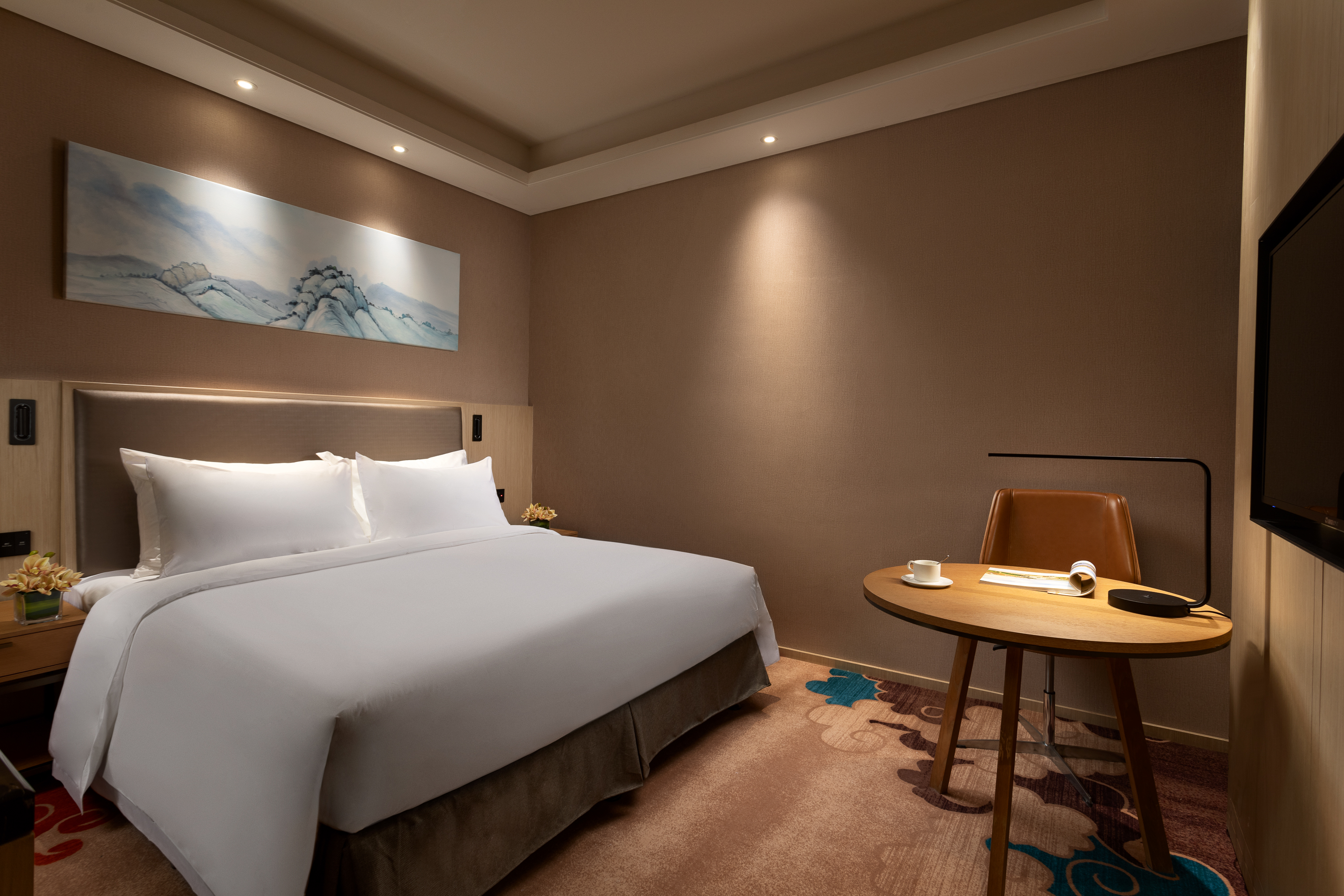 Guest room at the Ramada by Wyndham Zhengzhou Xinzheng in Xinzheng, Other than US/Canada