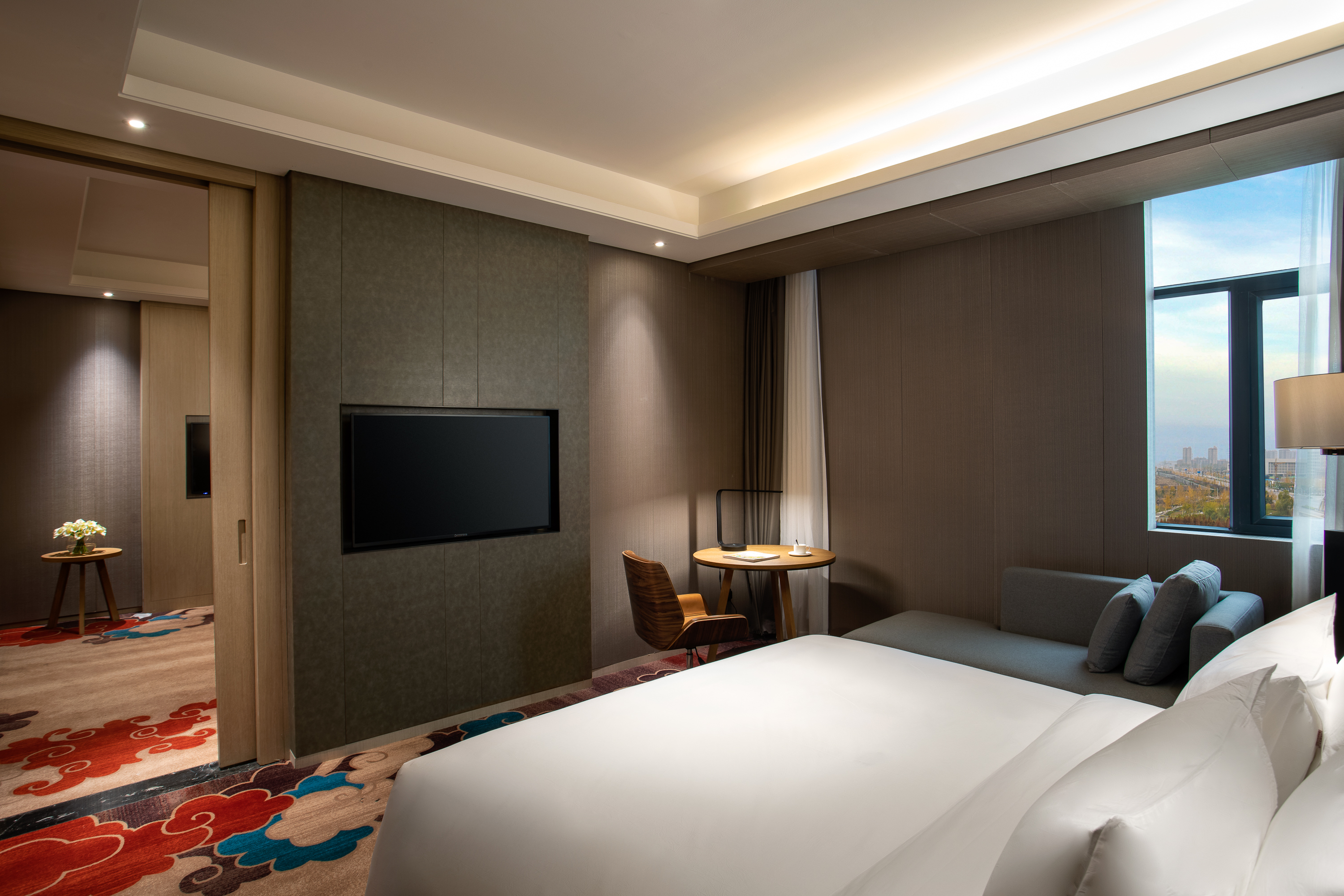 Guest room at the Ramada by Wyndham Zhengzhou Xinzheng in Xinzheng, Other than US/Canada