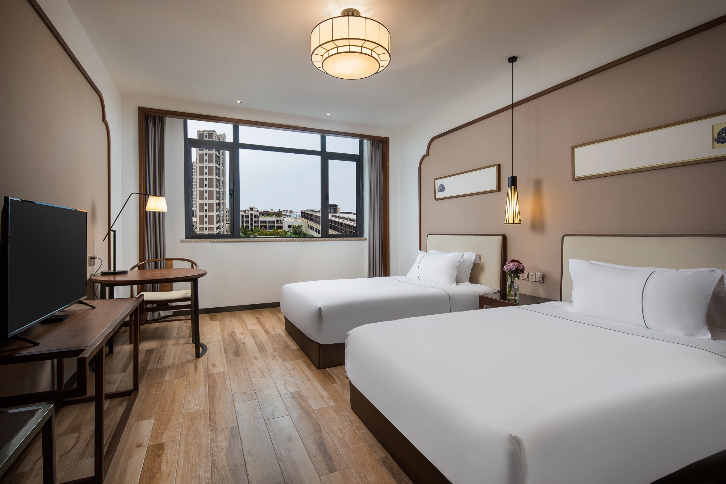 Guest room at the Ramada Encore by Wyndham Zhangpu in Zhangzhou, Other than US/Canada