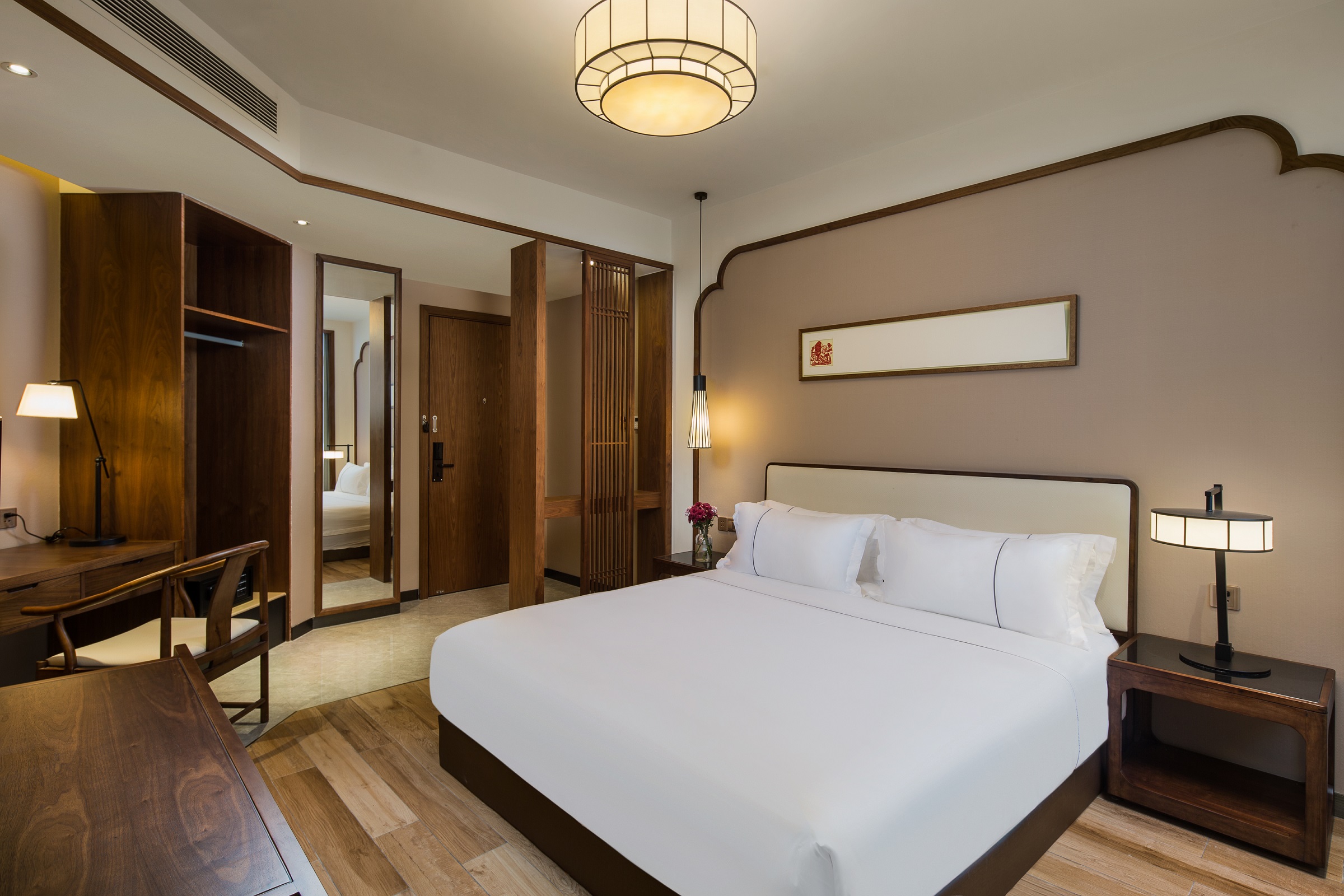 Guest room at the Ramada Encore by Wyndham Zhangpu in Zhangzhou, Other than US/Canada