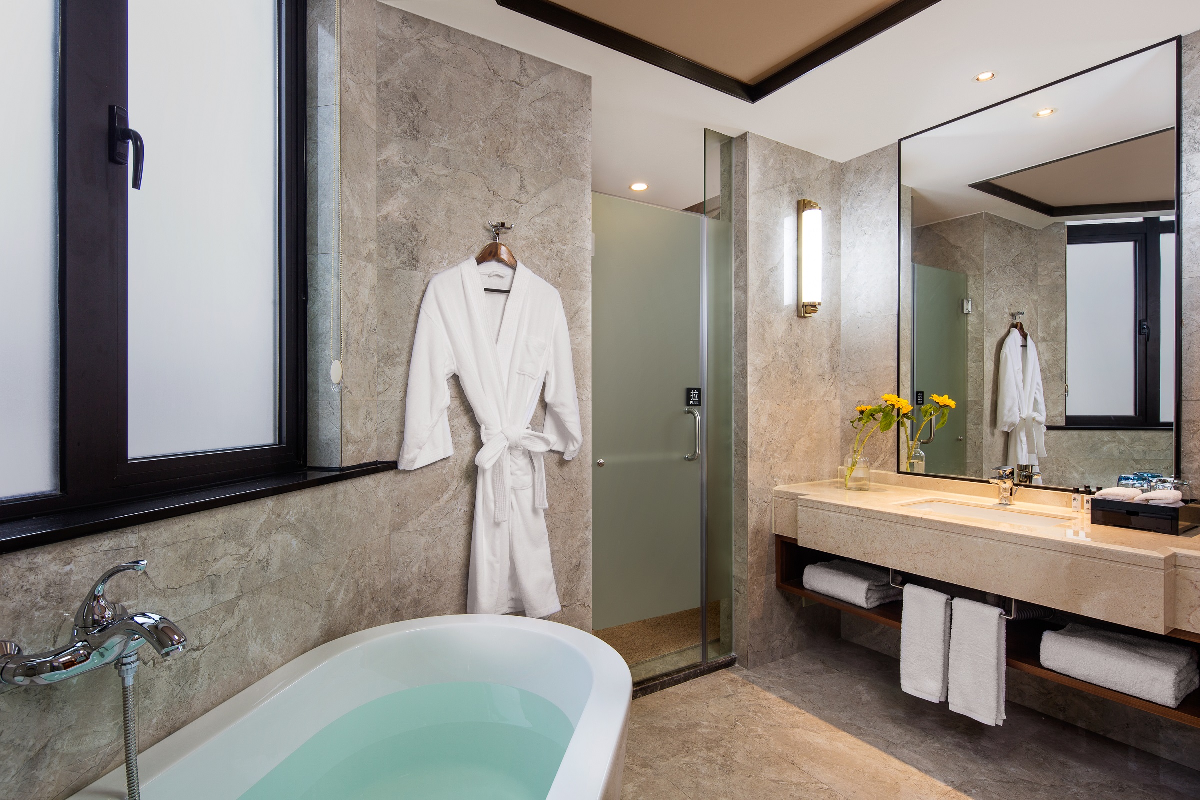 Guest room at the Ramada Encore by Wyndham Zhangpu in Zhangzhou, Other than US/Canada