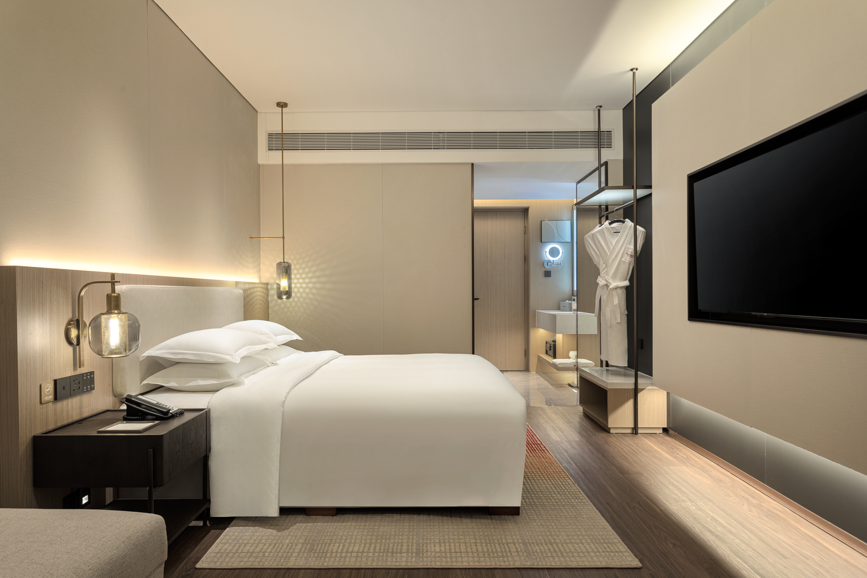 Guest room at the Ramada by Wyndham Zhuhai Xiangzhou in Zhuhai, Other than US/Canada