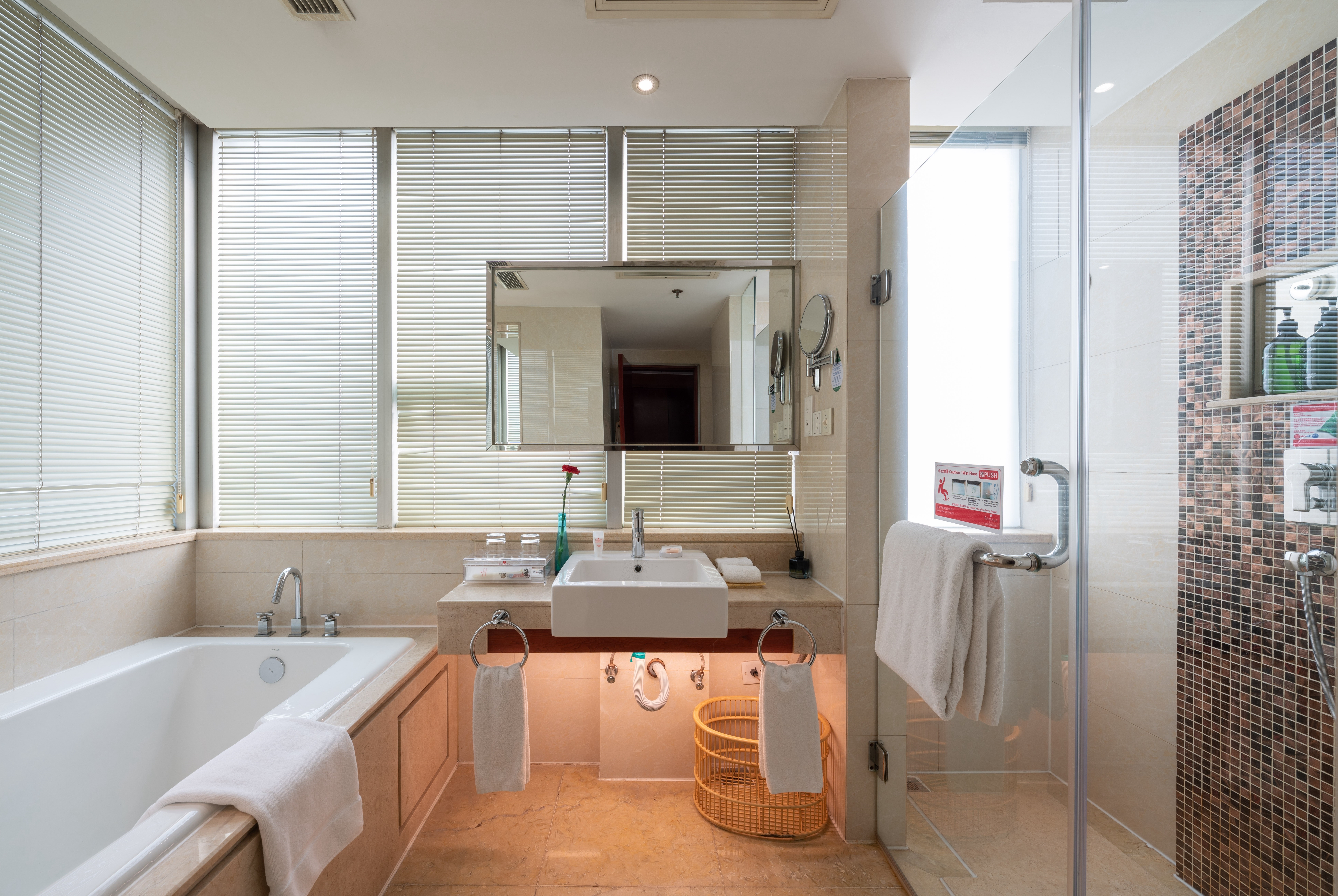 Guest room bath at the Ramada by Wyndham Zibo in Zibo, Other than US/Canada