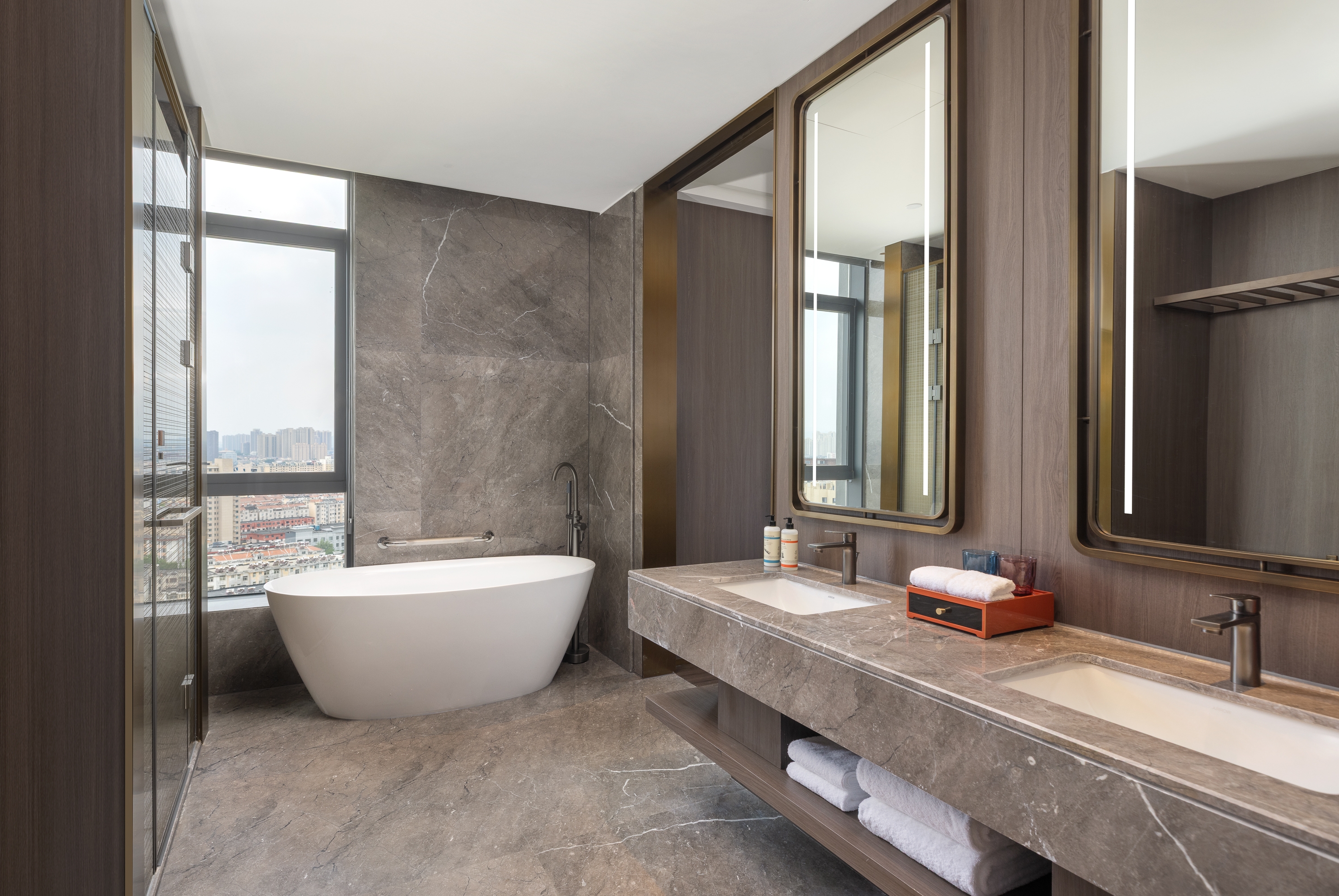 Guest room bath at the Ramada by Wyndham Zibo Zichuan in Zibo, Other than US/Canada