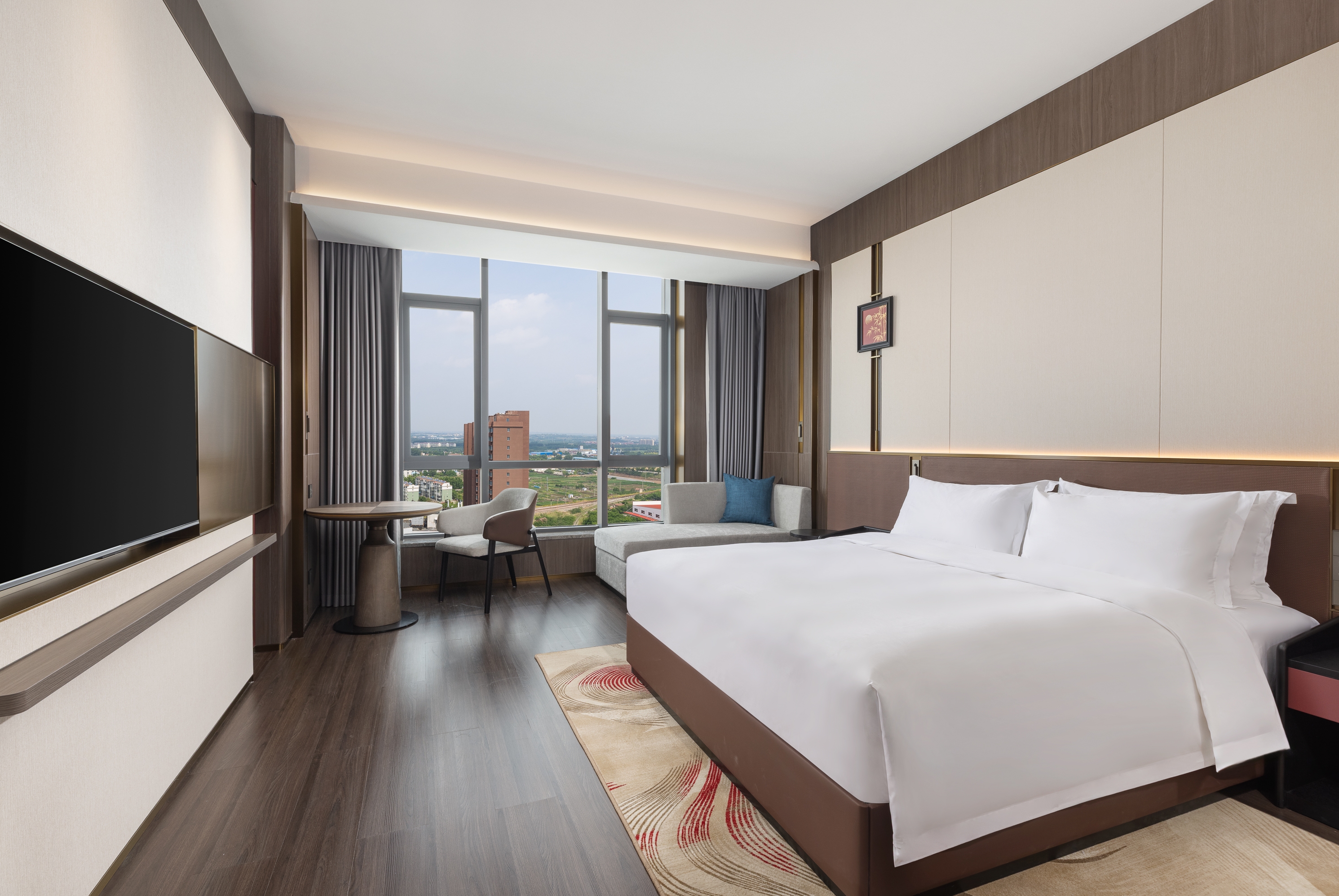 Guest room at the Ramada by Wyndham Zibo Zichuan in Zibo, Other than US/Canada