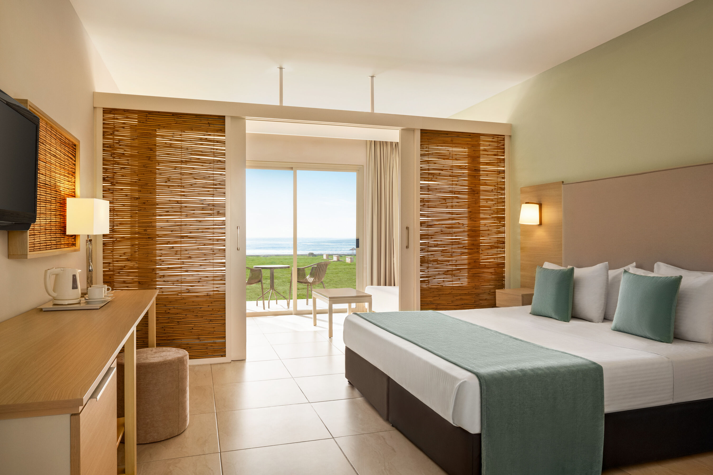 Guest room at the Ramada Hotel & Suites by Wyndham Ayia Napa in Famagusta, Other than US/Canada
