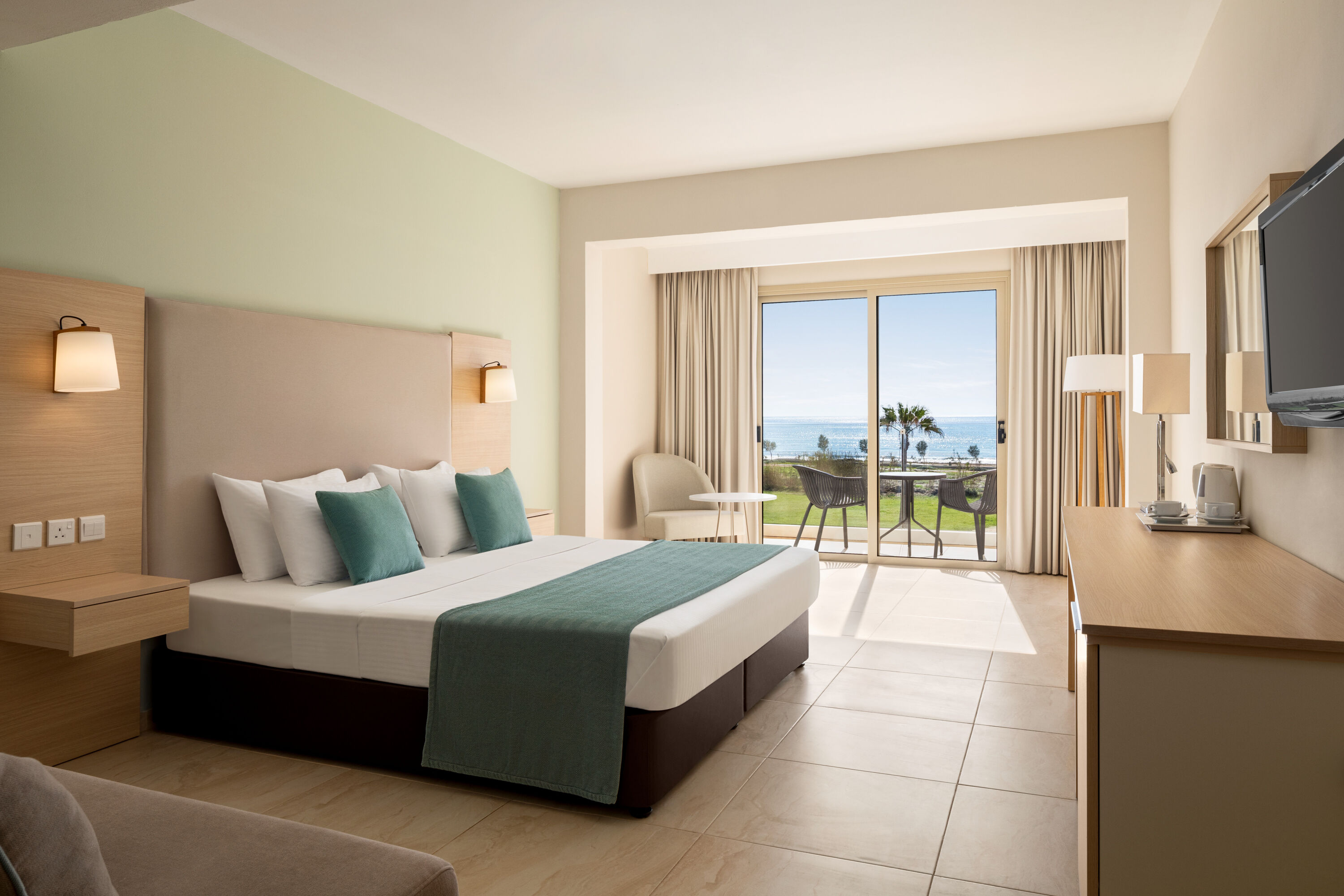 Guest room at the Ramada Hotel & Suites by Wyndham Ayia Napa in Famagusta, Other than US/Canada