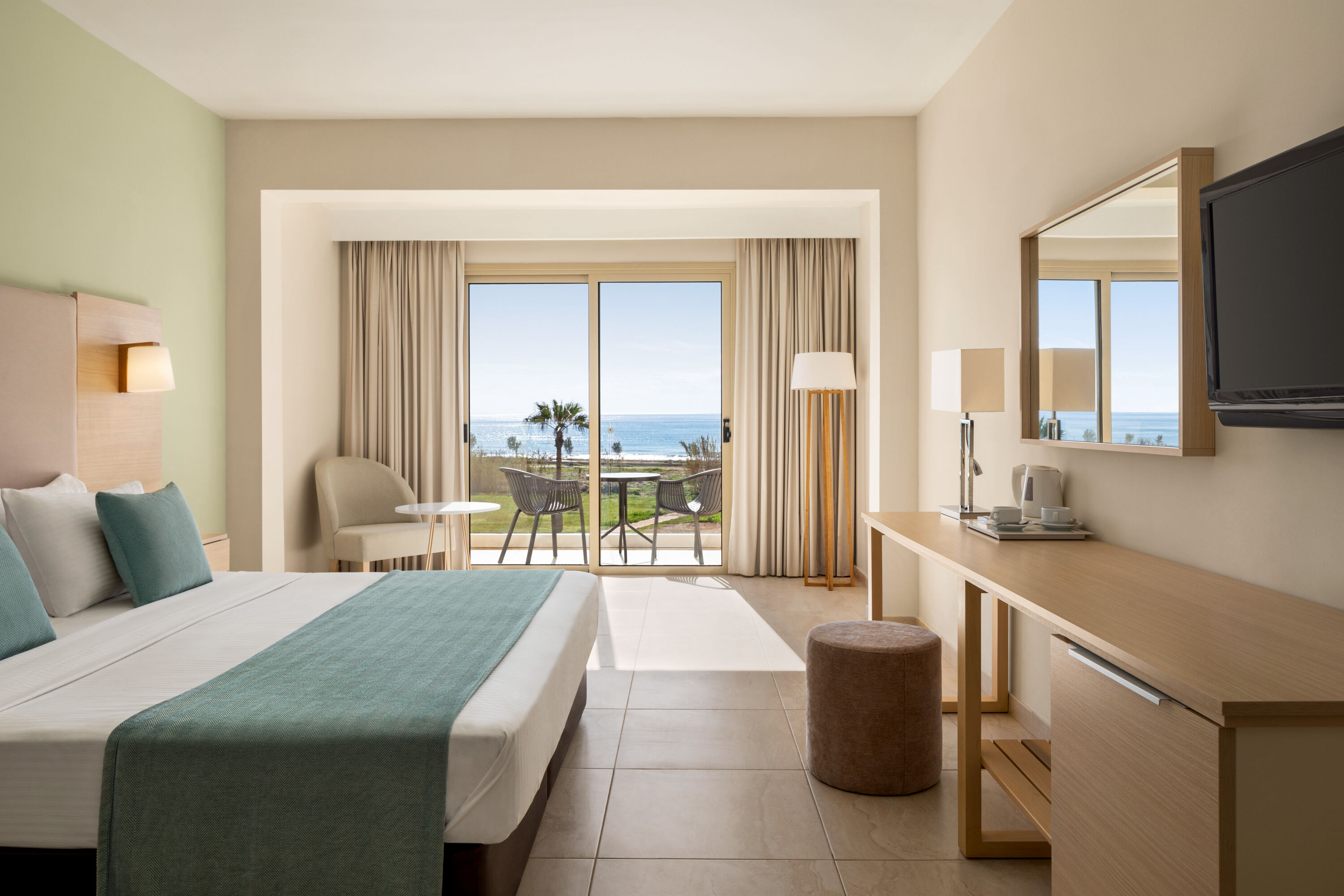 Guest room at the Ramada Hotel & Suites by Wyndham Ayia Napa in Famagusta, Other than US/Canada