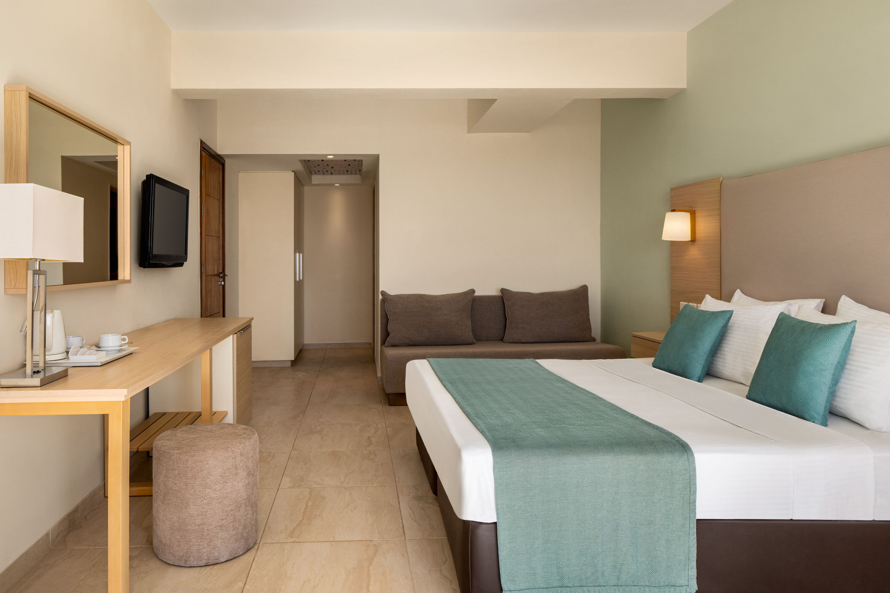 Guest room at the Ramada Hotel & Suites by Wyndham Ayia Napa in Famagusta, Other than US/Canada