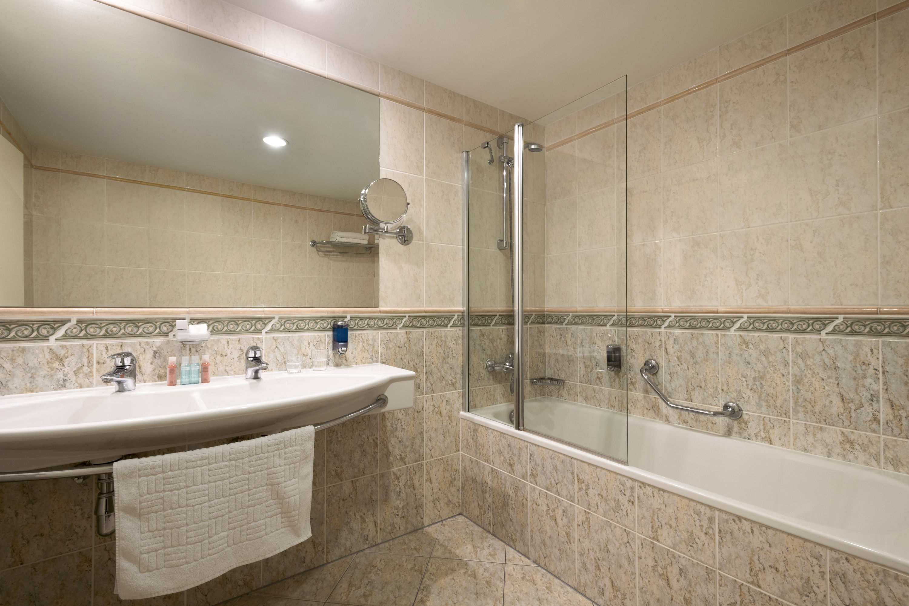 Guest room bath at the Ramada by Wyndham Prague City Centre in Prague, Other than US/Canada