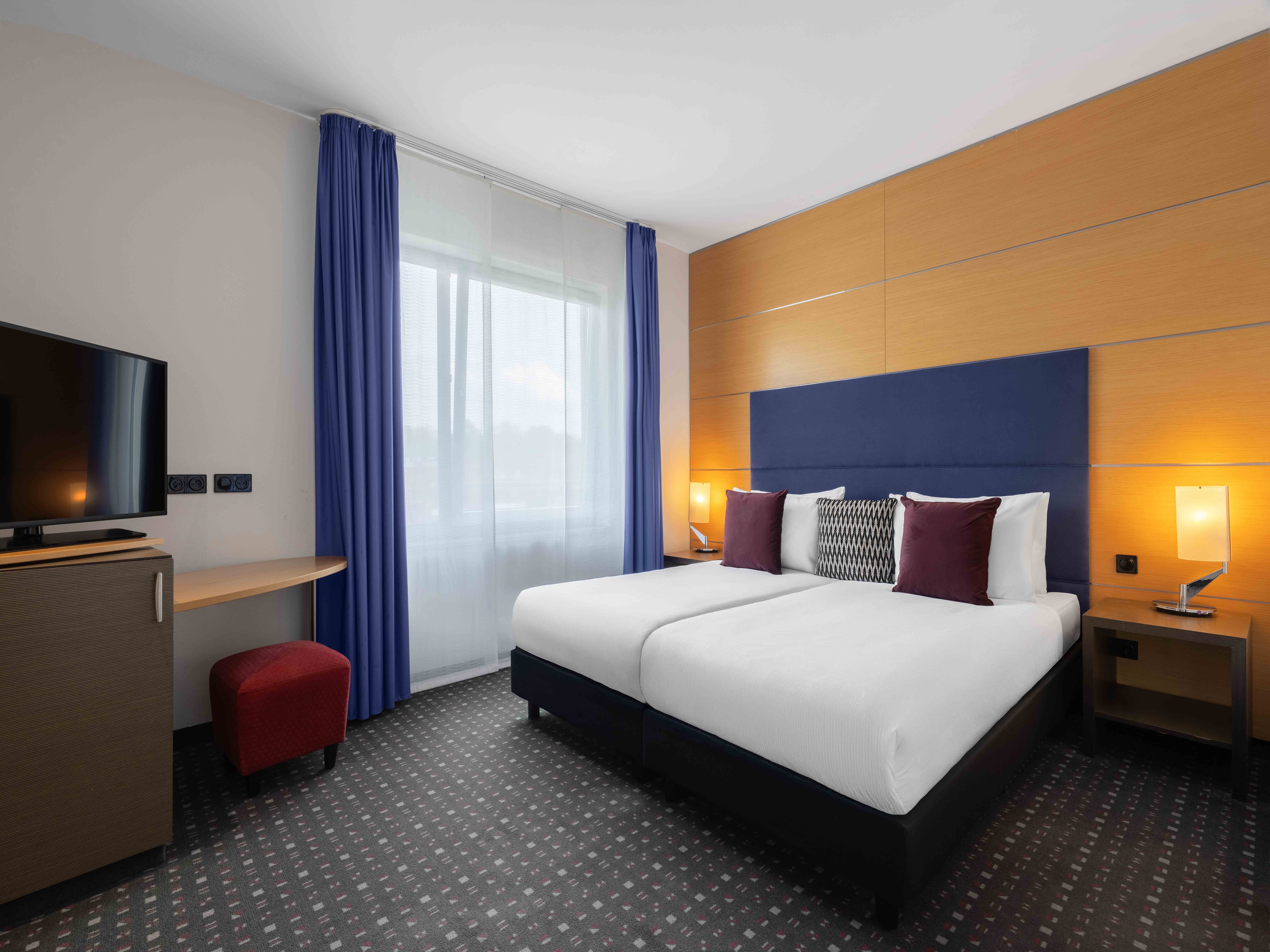 Guest room at the Ramada by Wyndham Essen in Essen, Other than US/Canada