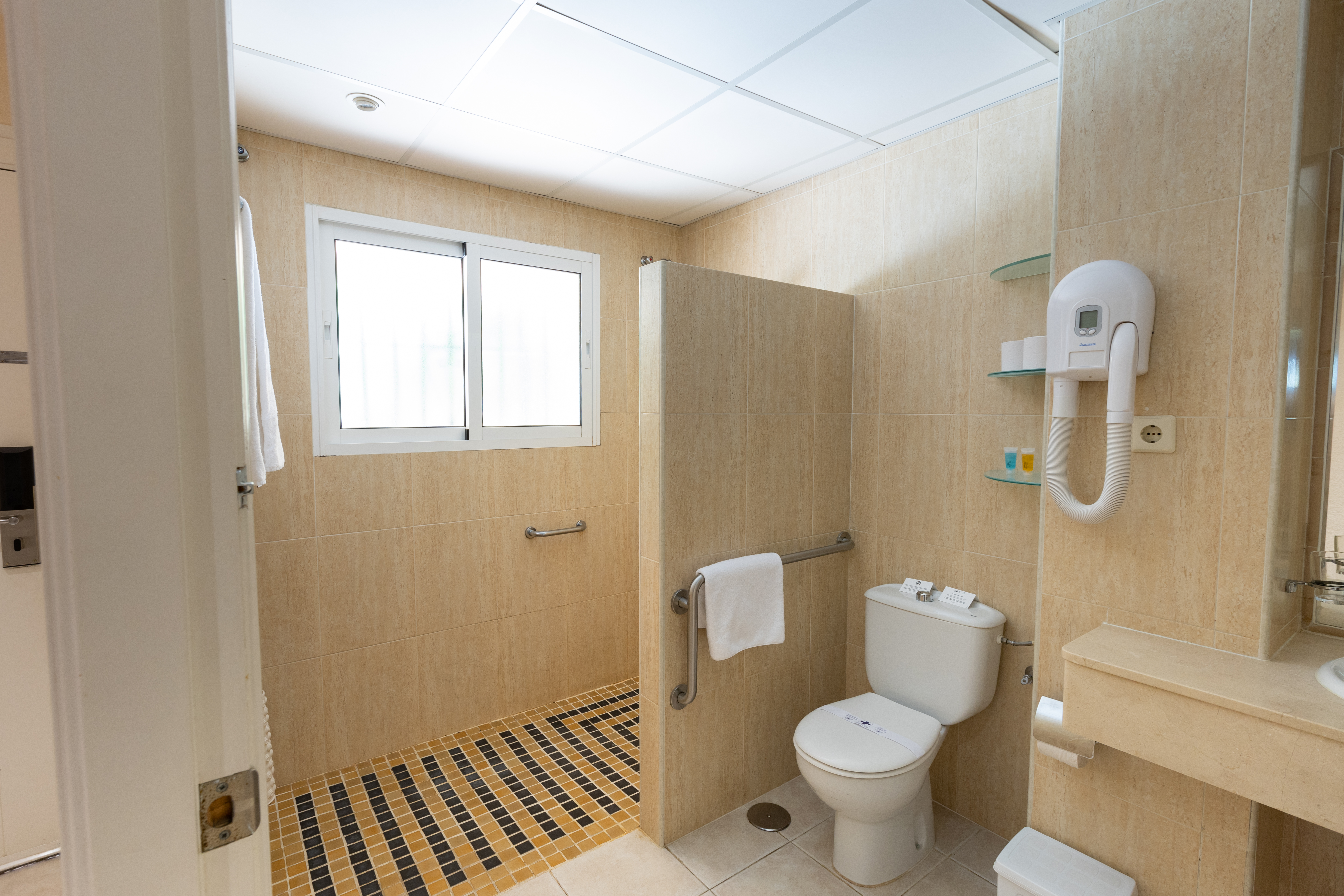 Guest room at the Ramada Hotel & Suites by Wyndham Costa del Sol Fuengirola in Mijas Costa, Other than US/Canada