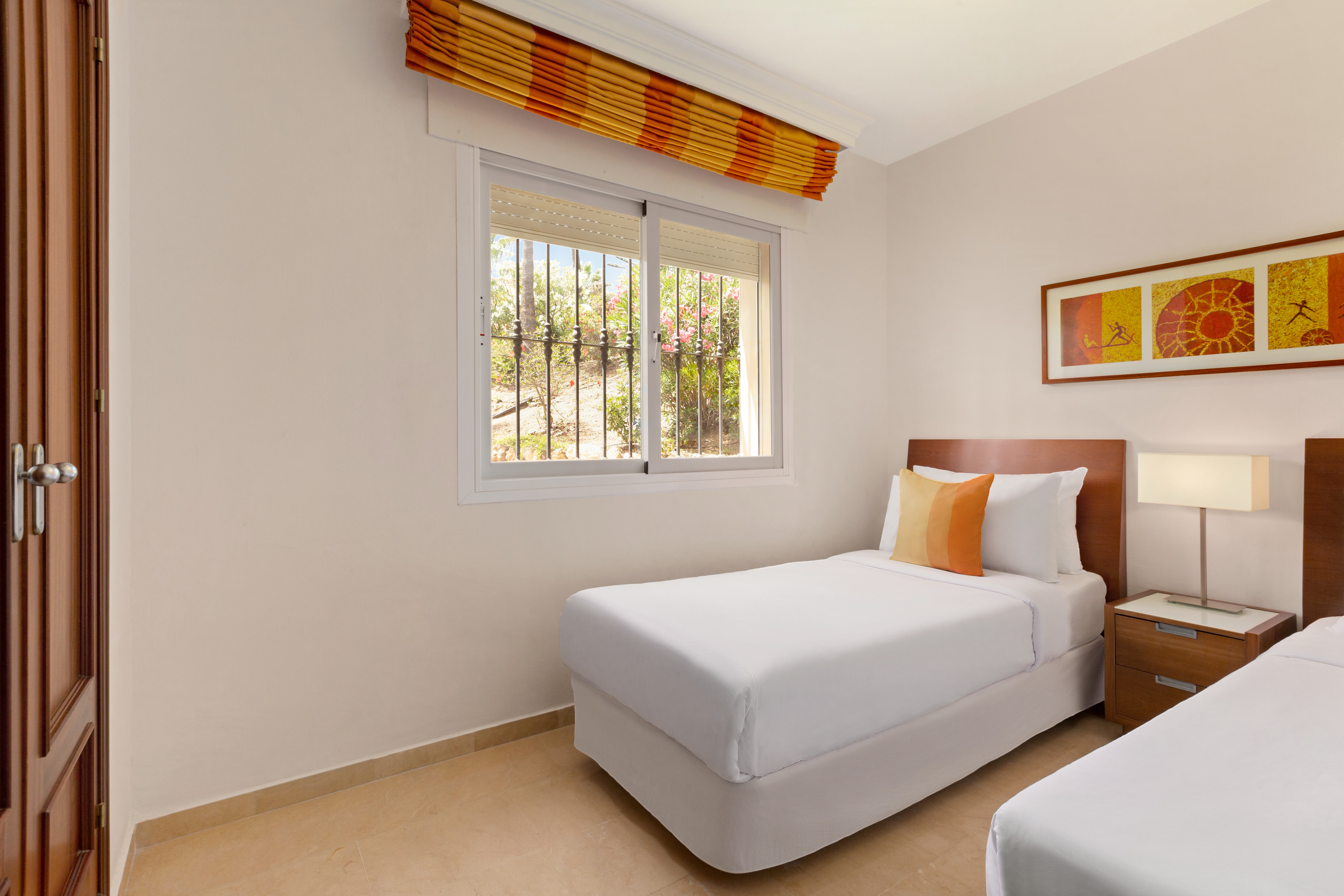 Guest room at the Ramada Hotel & Suites by Wyndham Costa del Sol Fuengirola in Mijas Costa, Other than US/Canada