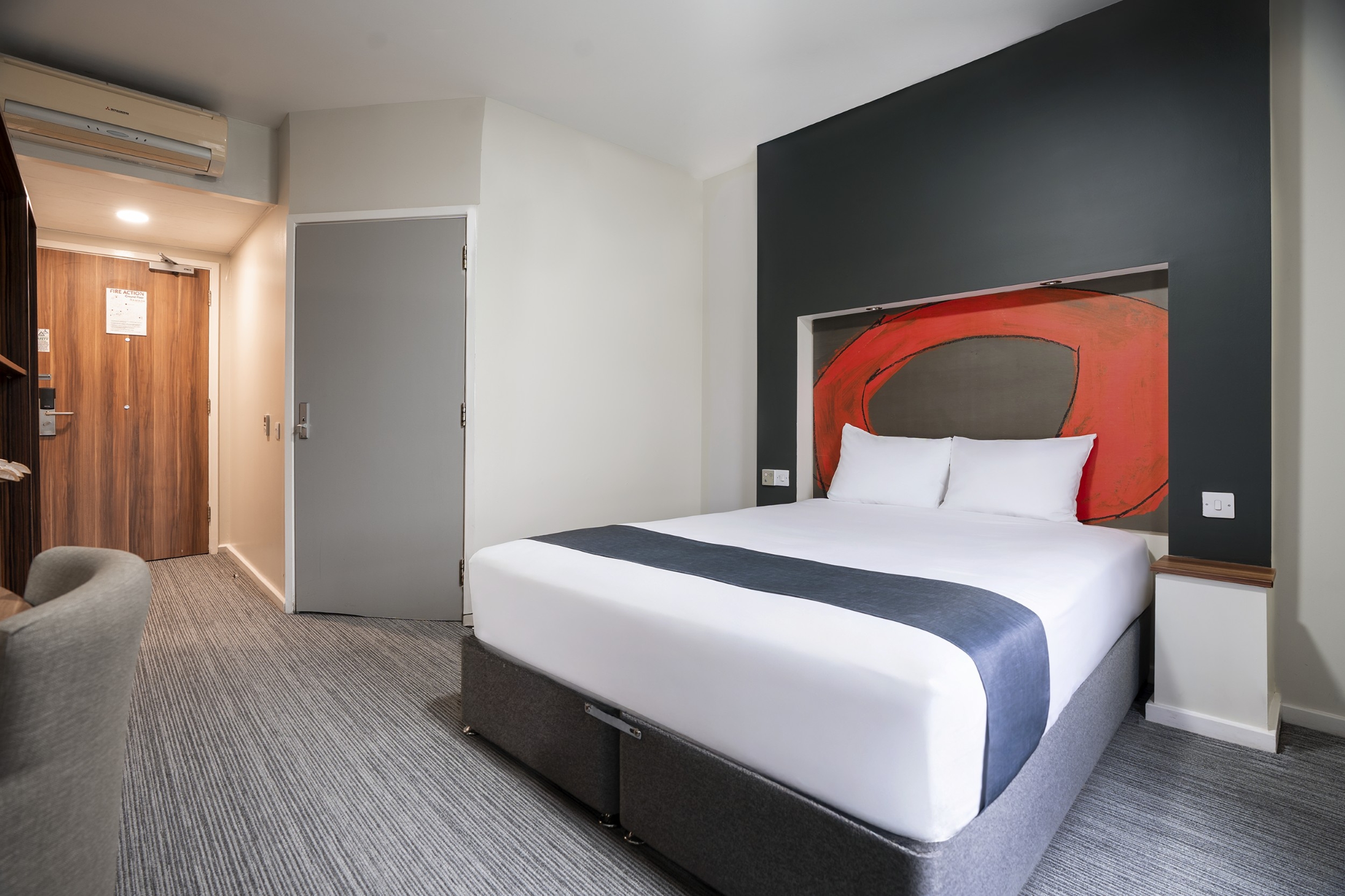 Guest room at the Ramada by Wyndham London Stansted Airport in Bishops Stortford, Other than US/Canada