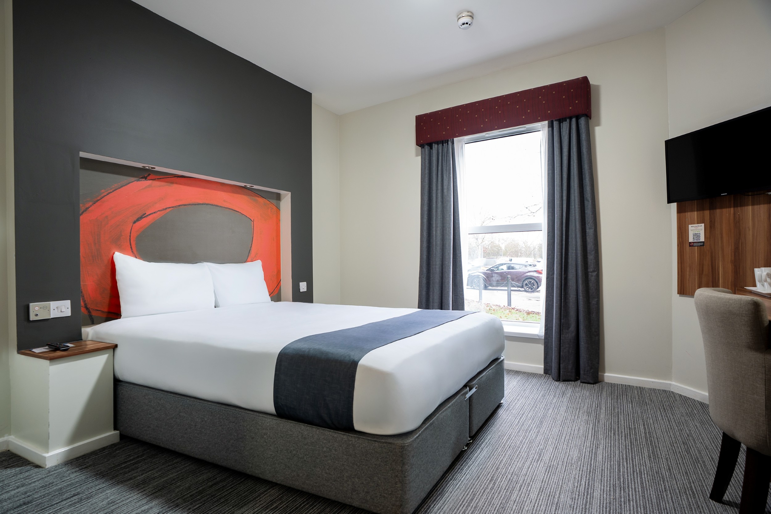 Guest room at the Ramada by Wyndham London Stansted Airport in Bishops Stortford, Other than US/Canada