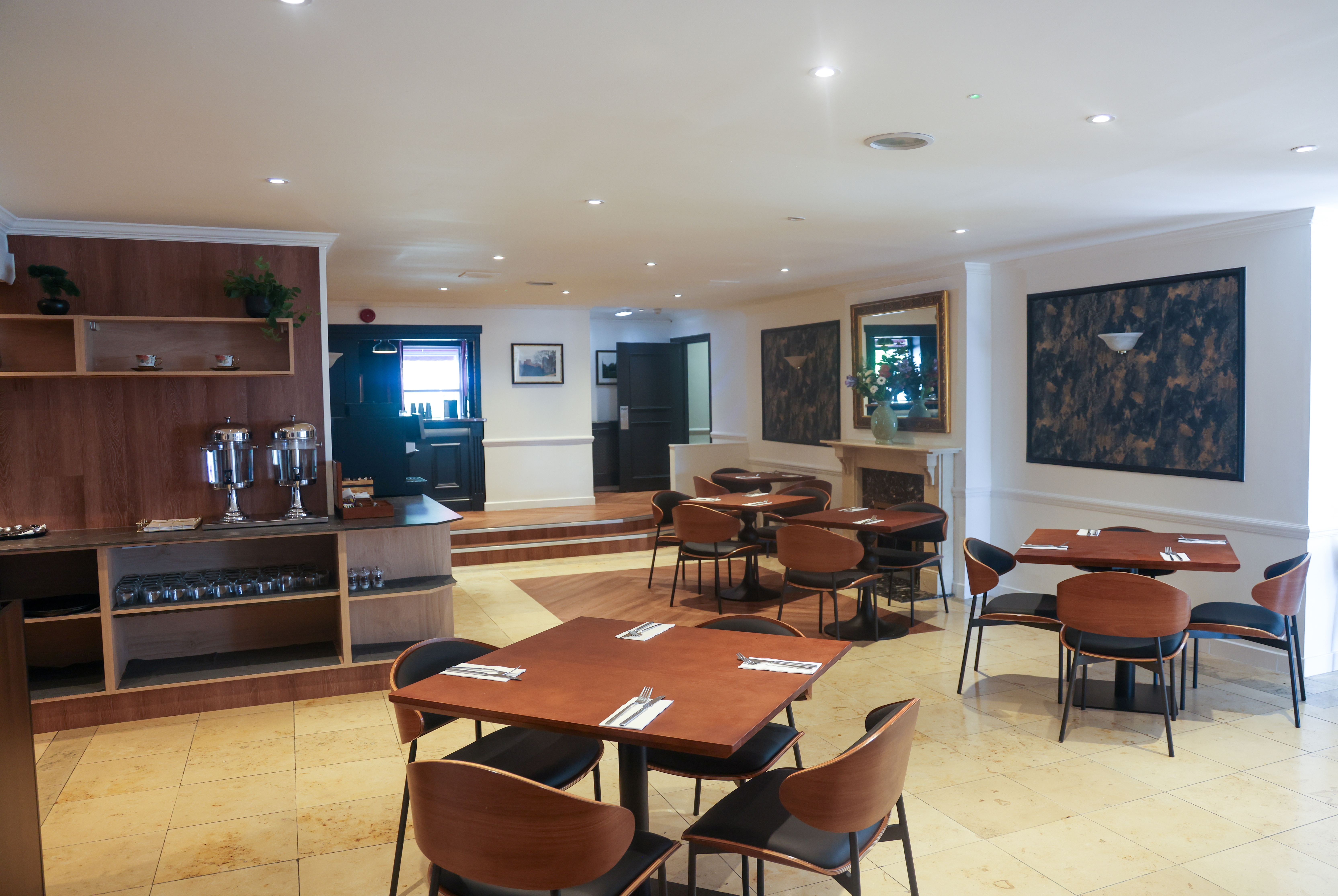 Ramada by Wyndham Cheltenham restaurant breakfast area with seating in Cheltenham, Other than US/Canada