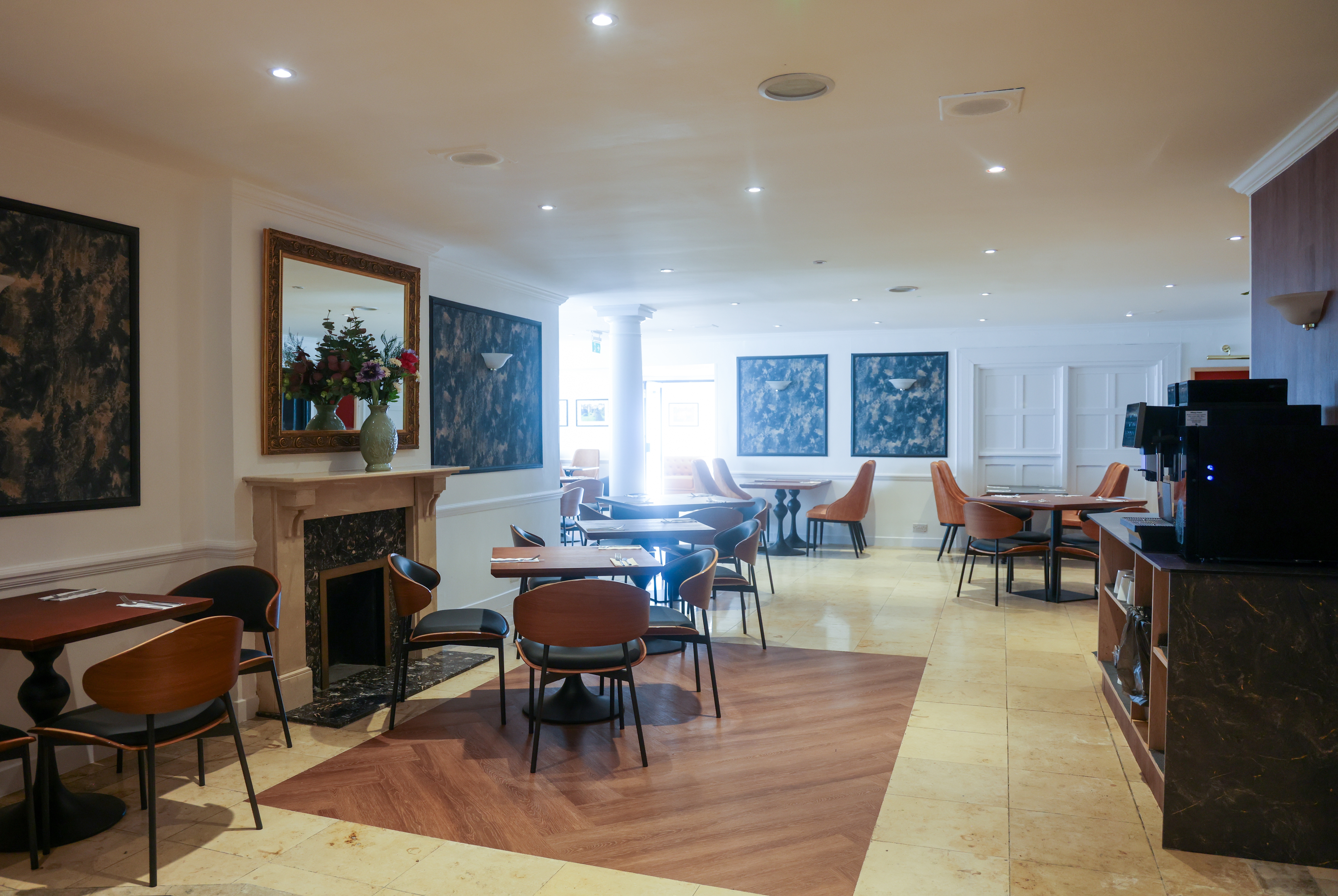 Ramada by Wyndham Cheltenham restaurant breakfast area with seating in Cheltenham, Other than US/Canada