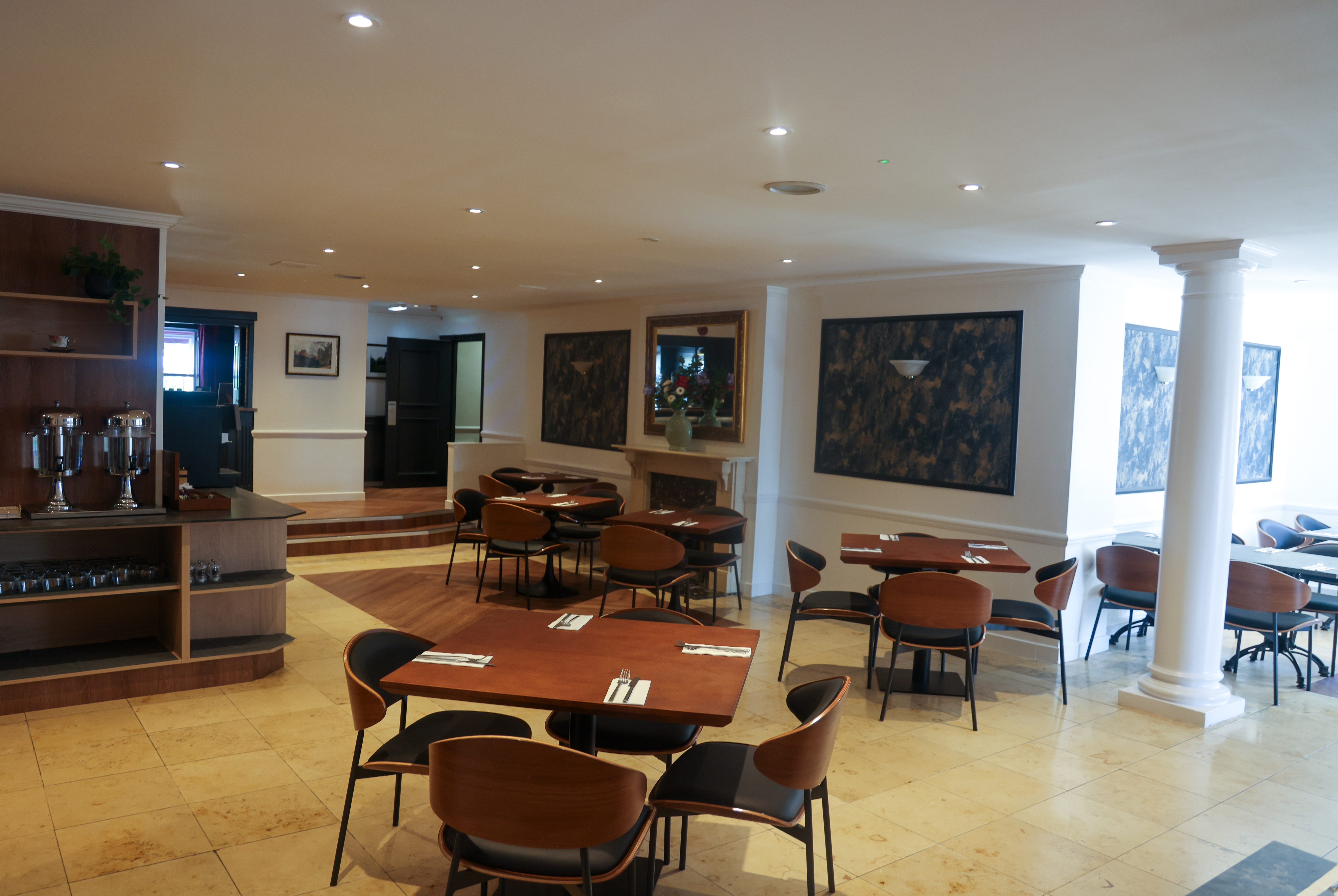Ramada by Wyndham Cheltenham restaurant breakfast area with seating in Cheltenham, Other than US/Canada