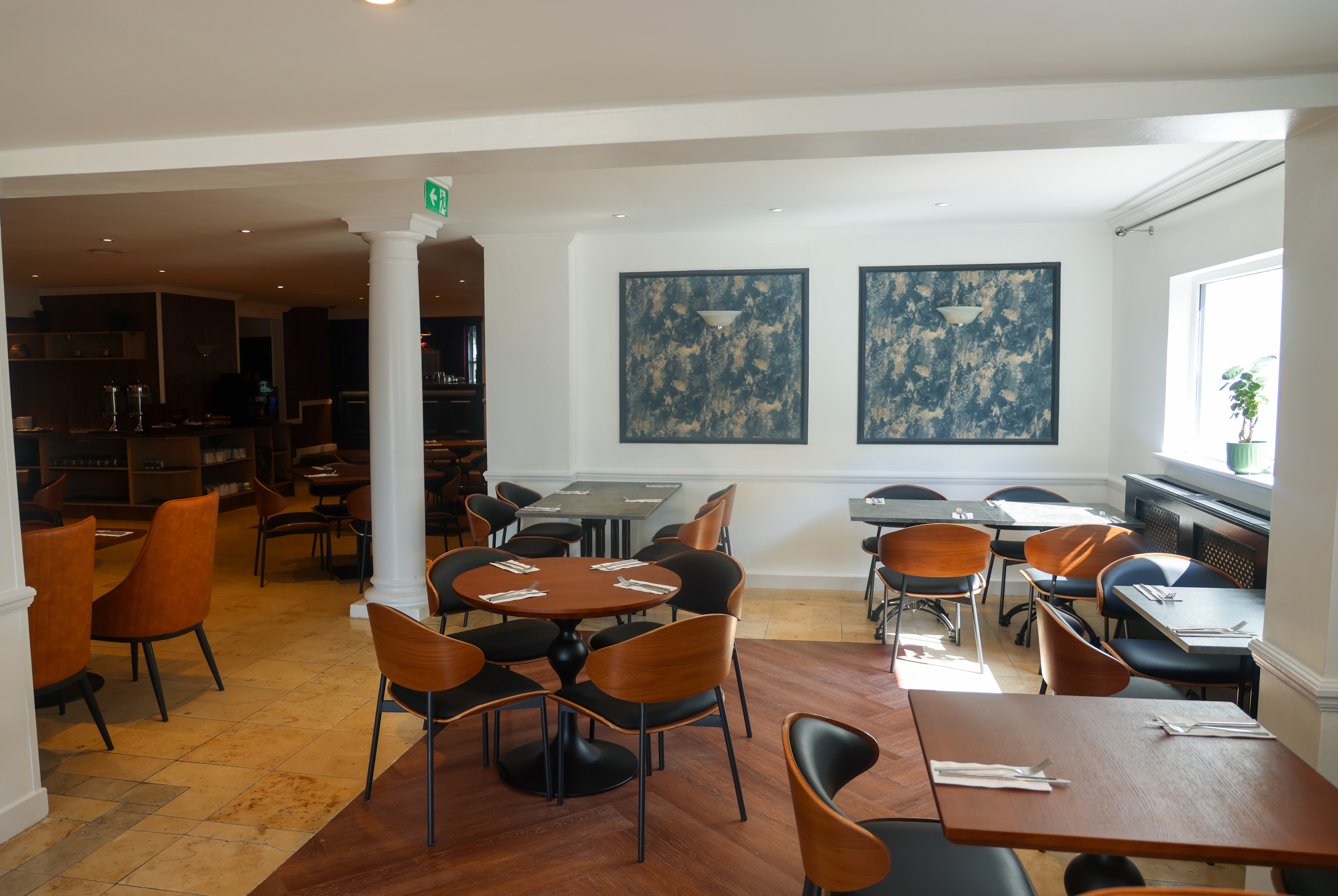 Ramada by Wyndham Cheltenham restaurant breakfast area with seating in Cheltenham, Other than US/Canada