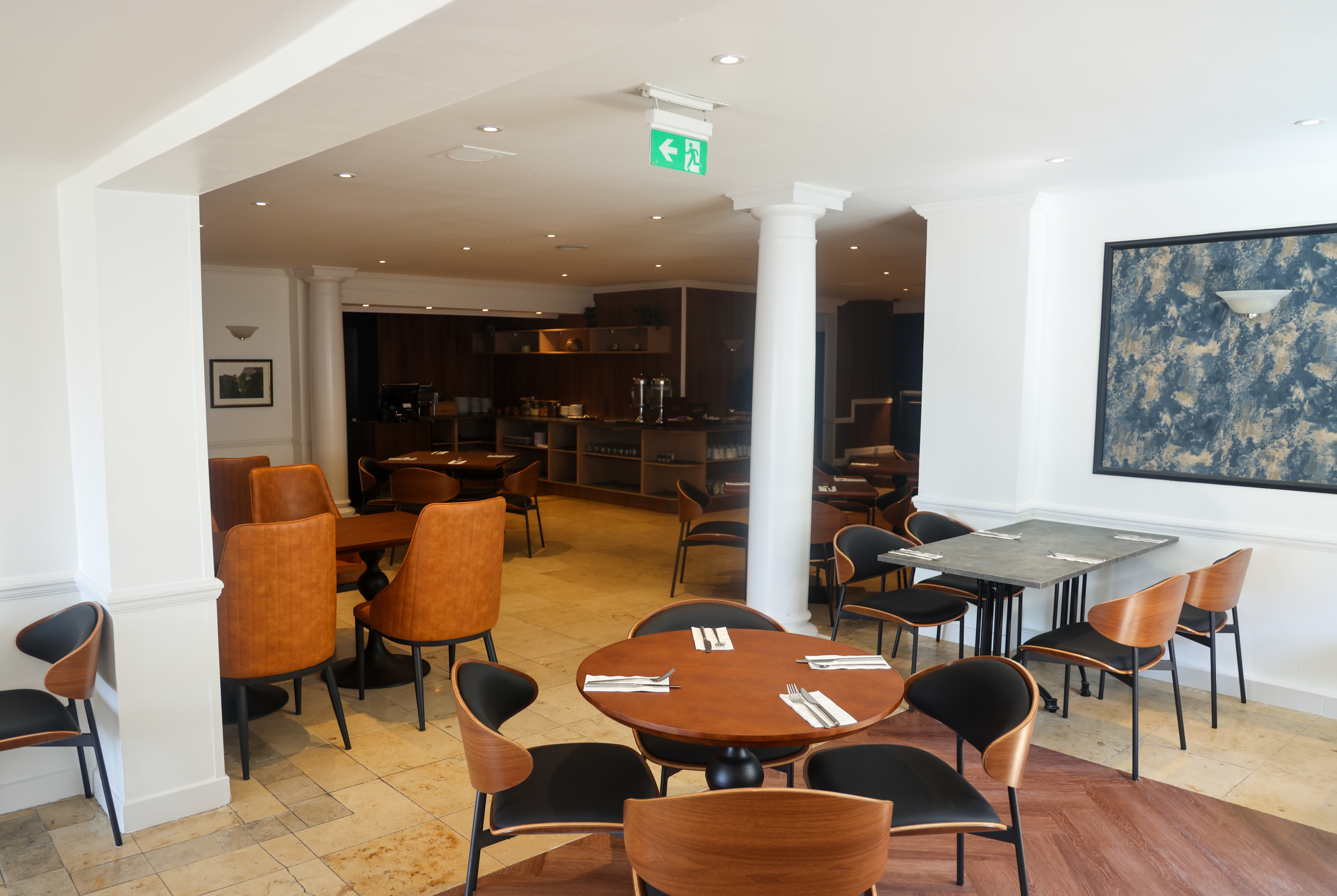 Ramada by Wyndham Cheltenham restaurant breakfast area with seating in Cheltenham, Other than US/Canada