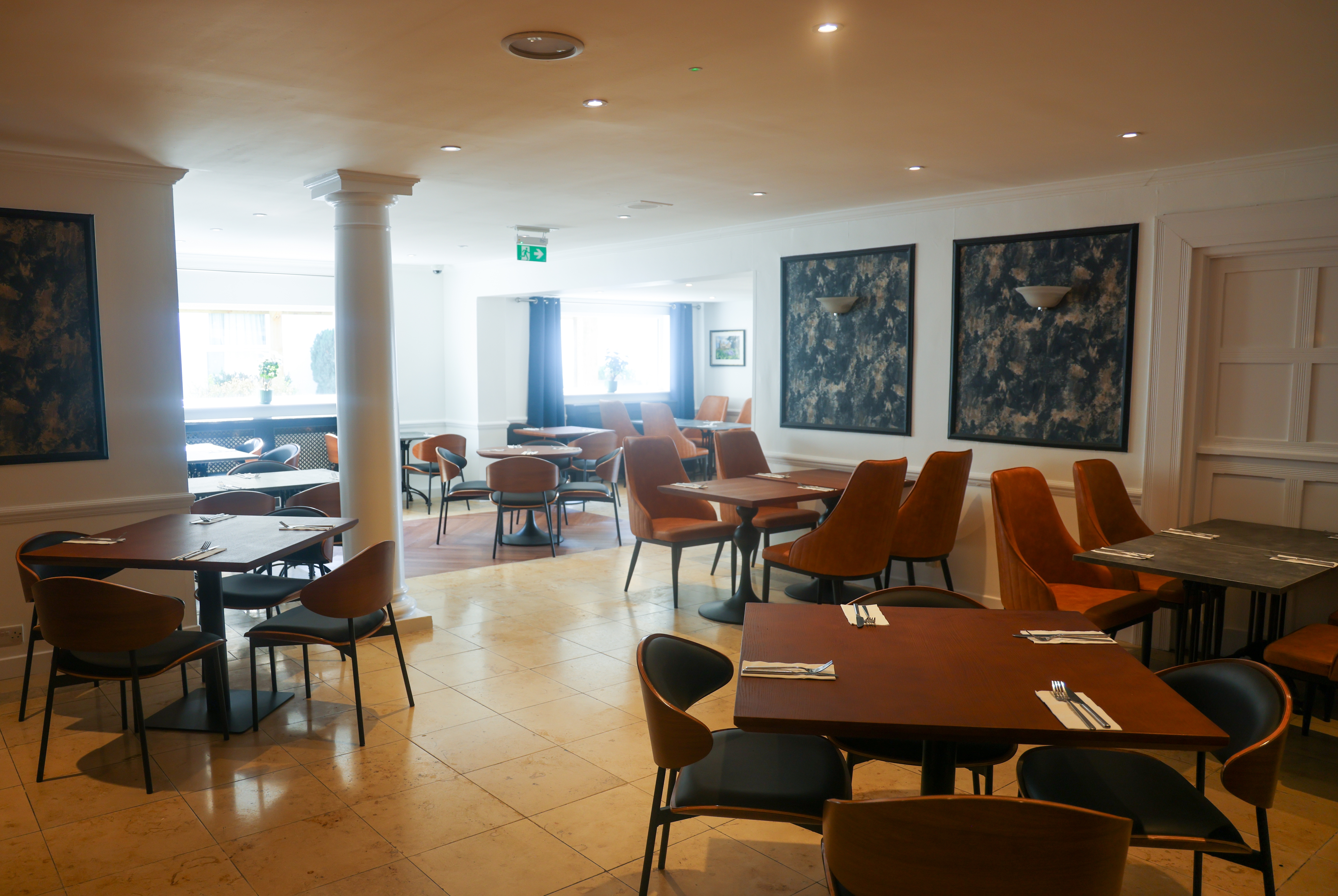 Ramada by Wyndham Cheltenham restaurant breakfast area with seating in Cheltenham, Other than US/Canada