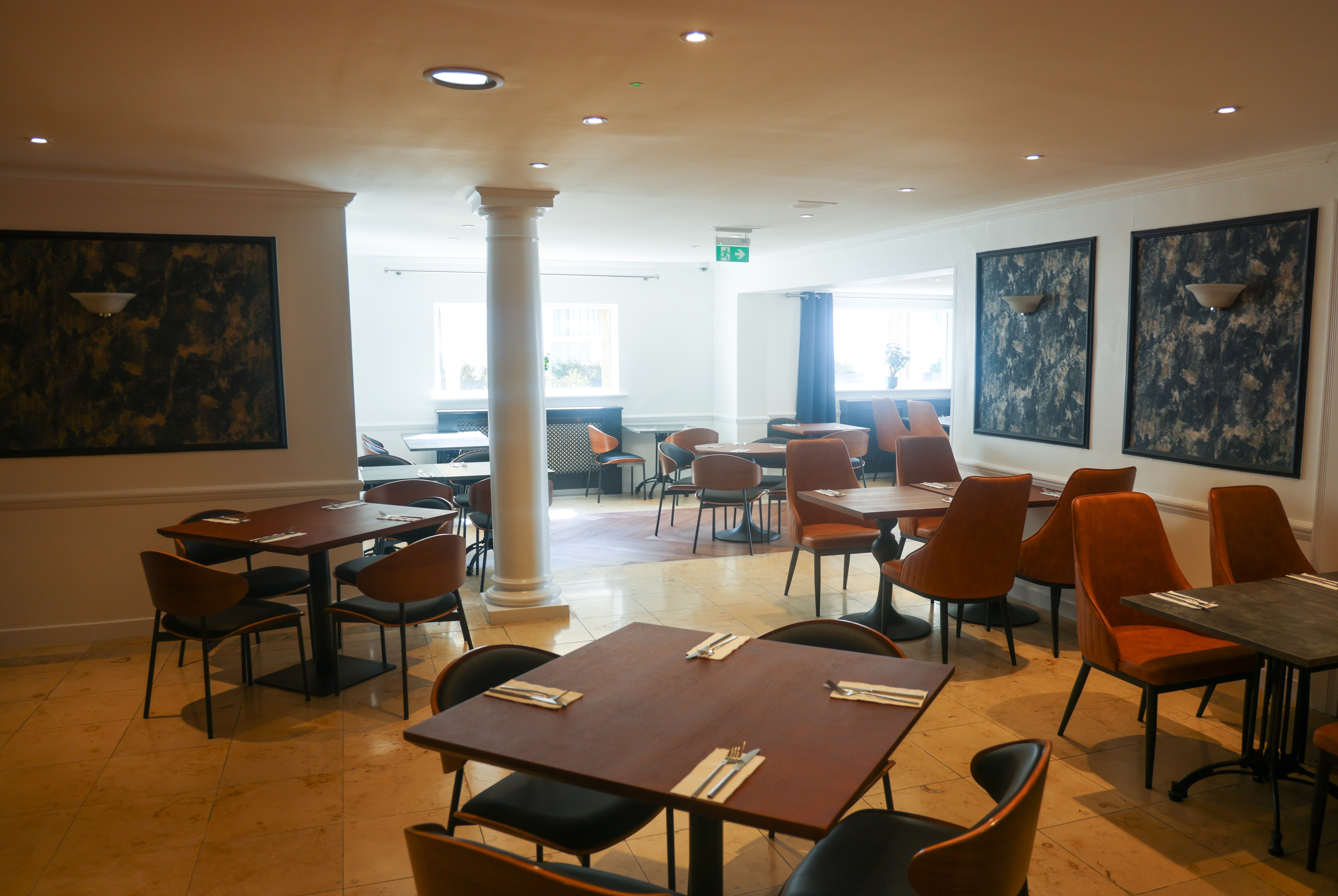 Ramada by Wyndham Cheltenham restaurant breakfast area with seating in Cheltenham, Other than US/Canada