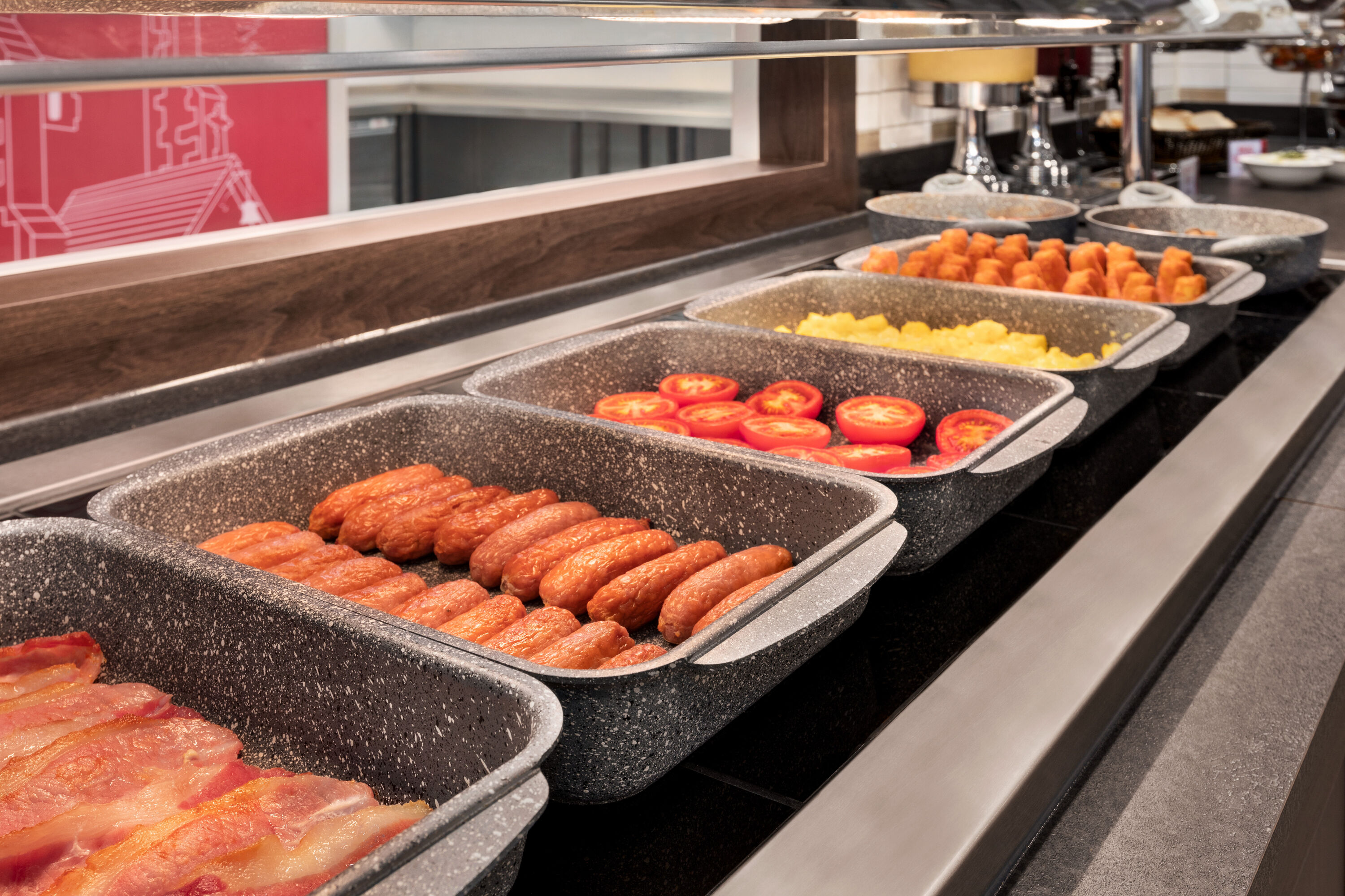 Ramada by Wyndham Cobham restaurant breakfast area with seating in Cobham, Other than US/Canada