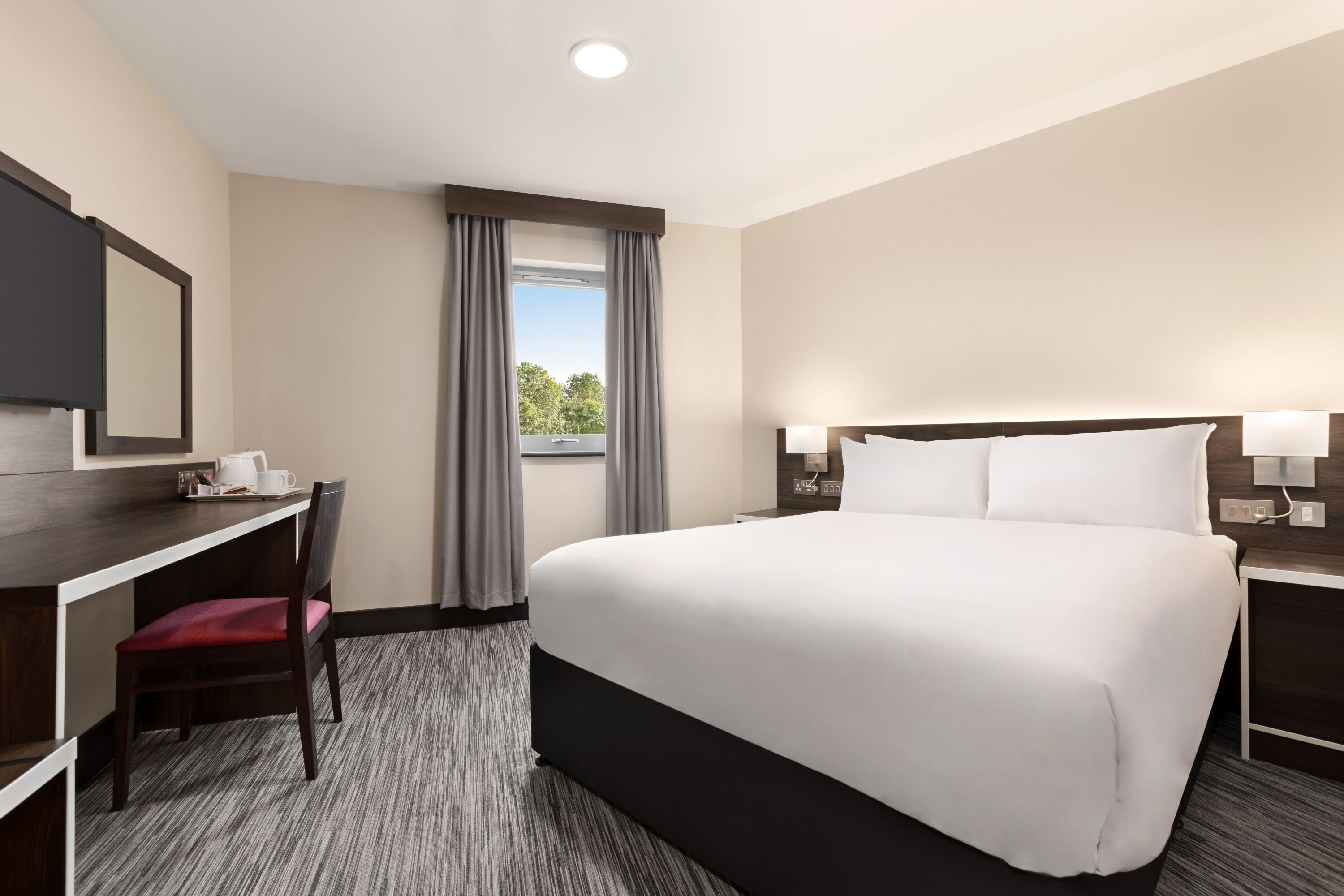 Guest room at the Ramada by Wyndham Cobham in Cobham, Other than US/Canada