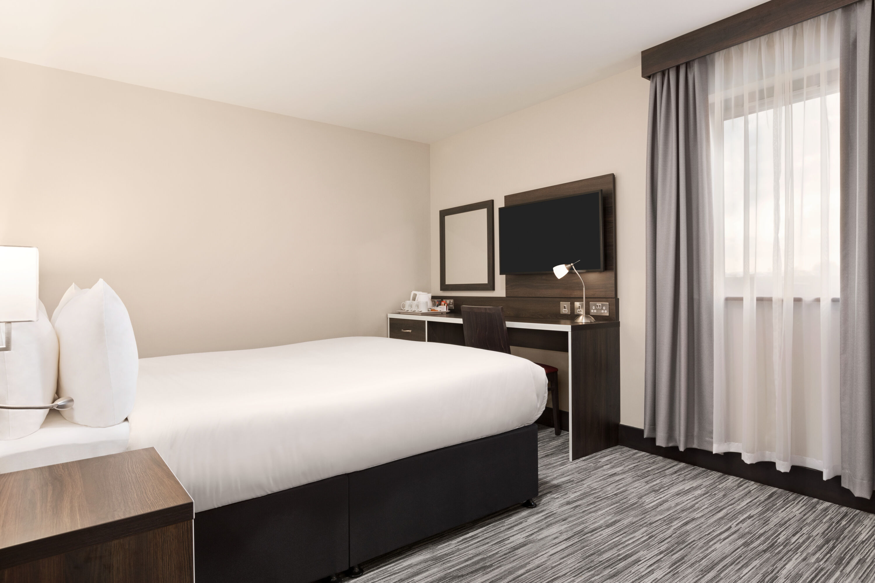 Guest room at the Ramada by Wyndham Cobham in Cobham, Other than US/Canada