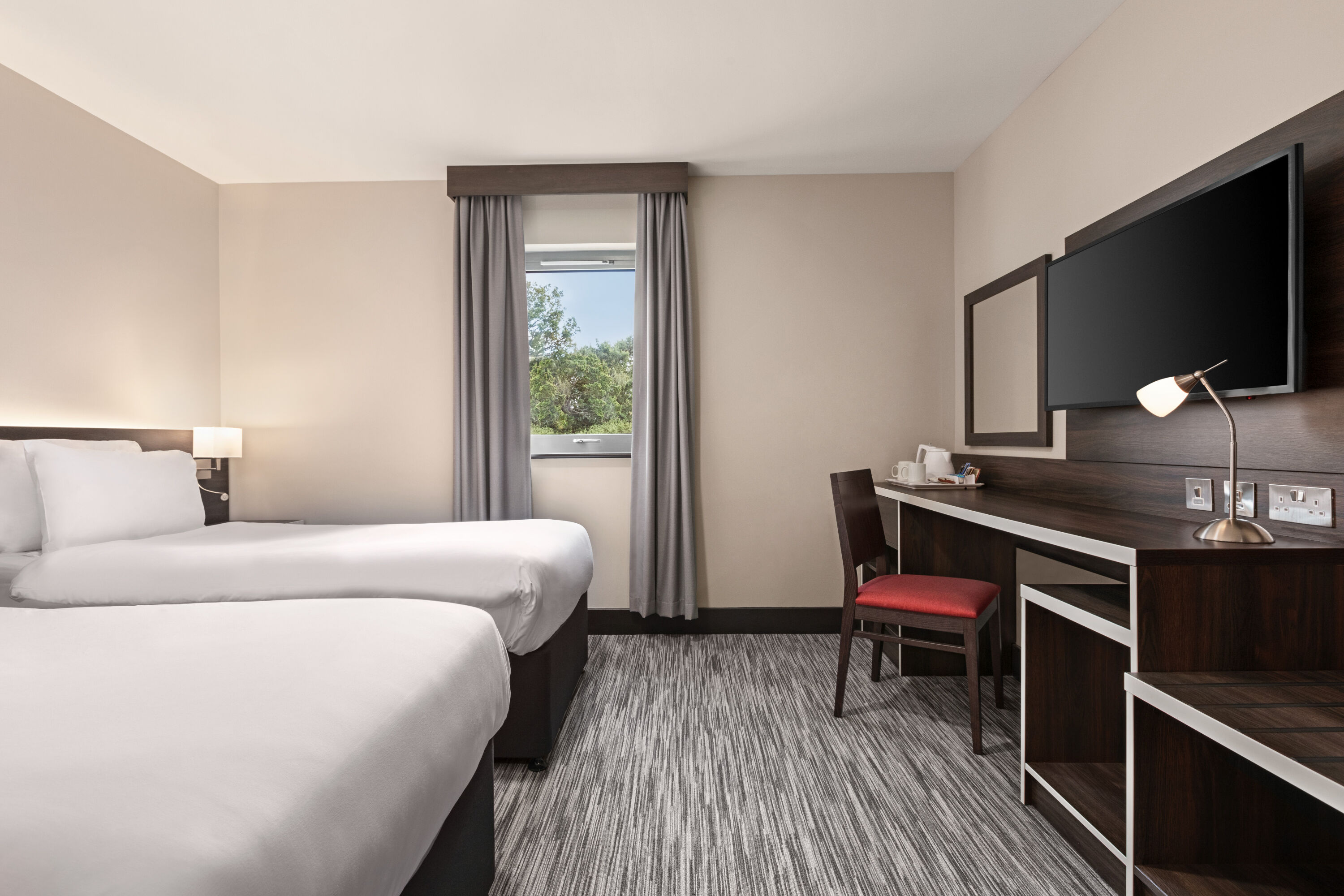 Guest room at the Ramada by Wyndham Cobham in Cobham, Other than US/Canada