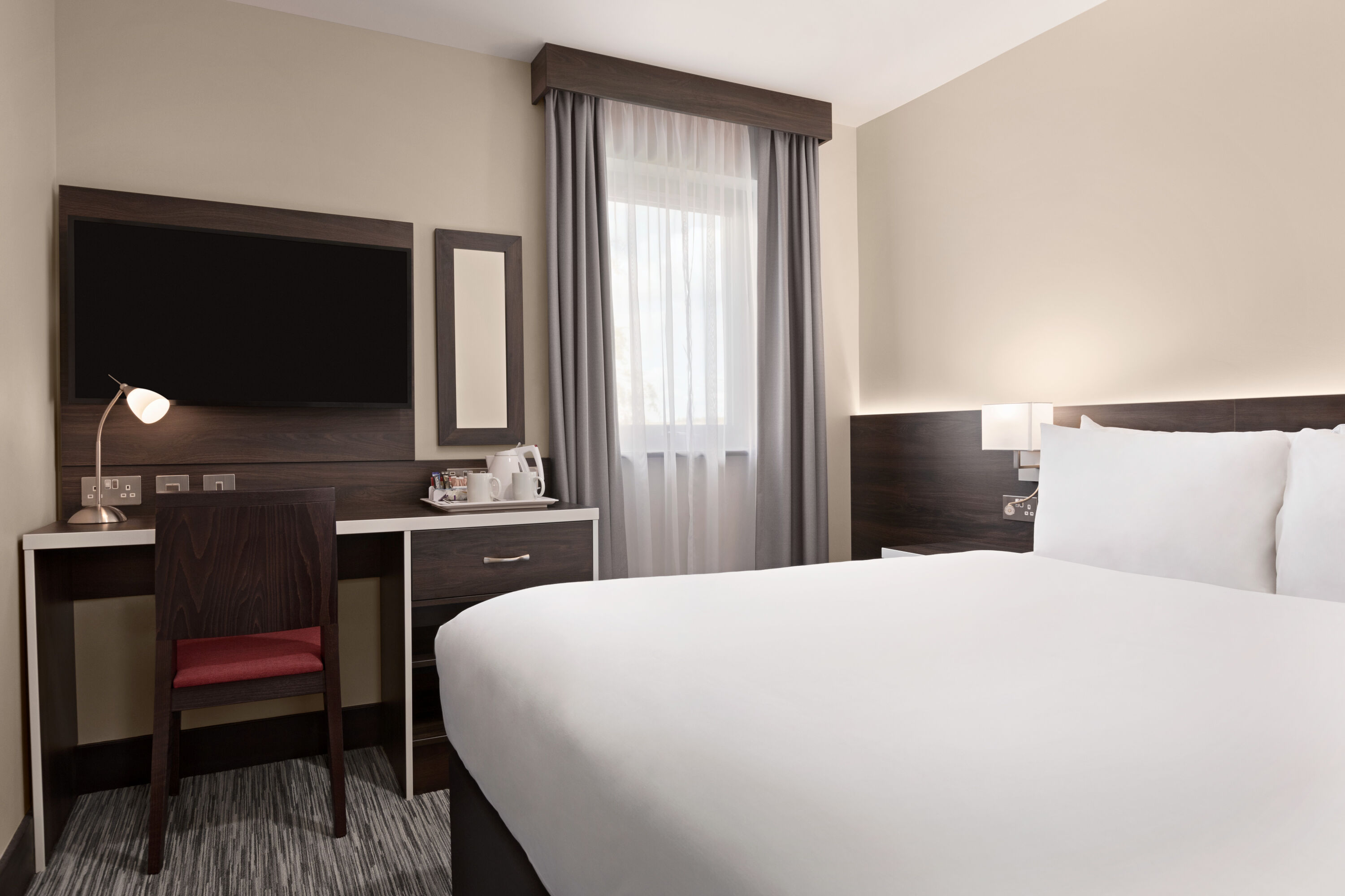 Guest room at the Ramada by Wyndham Cobham in Cobham, Other than US/Canada