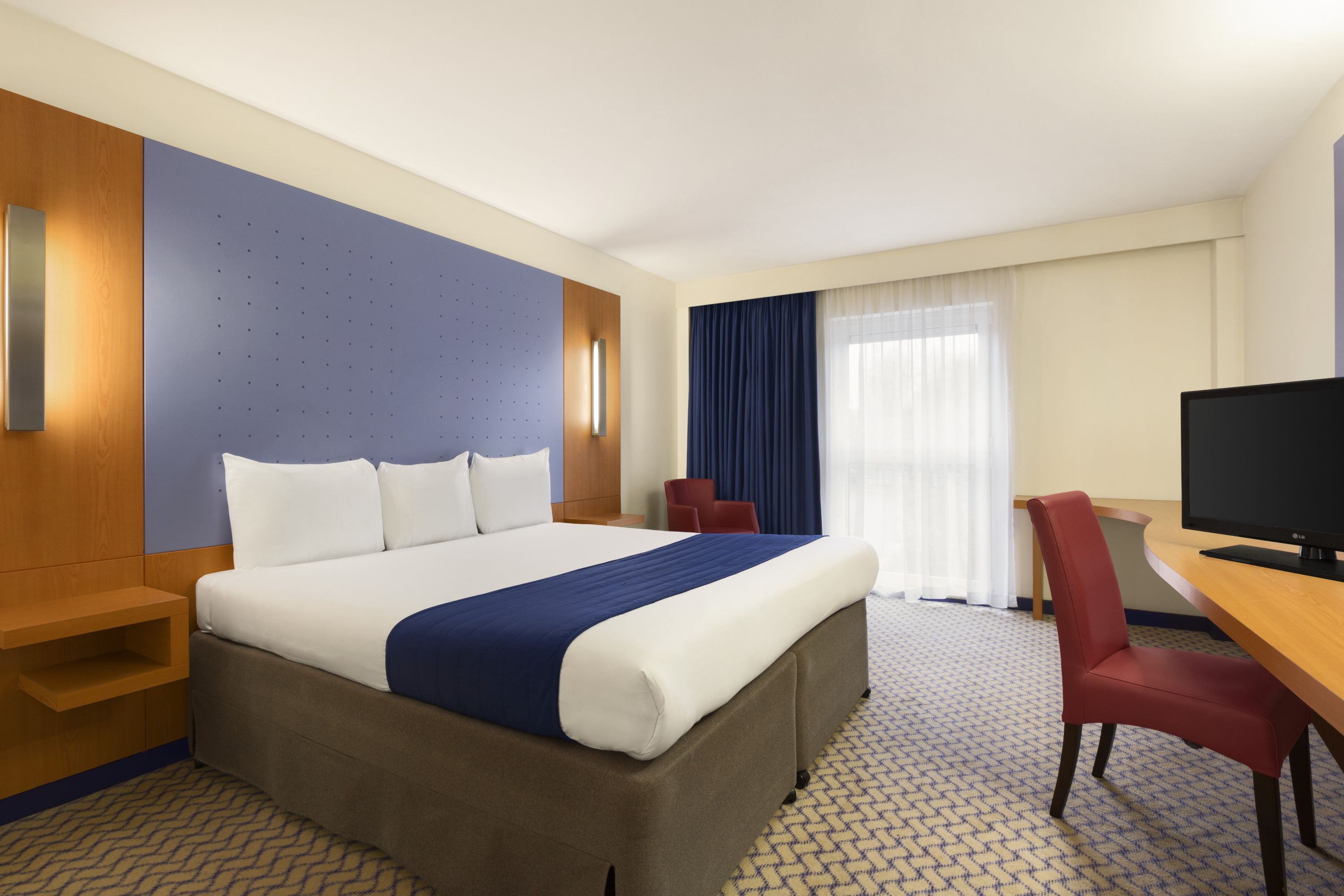 Guest room at the Ramada by Wyndham London North M1 in London, Other than US/Canada
