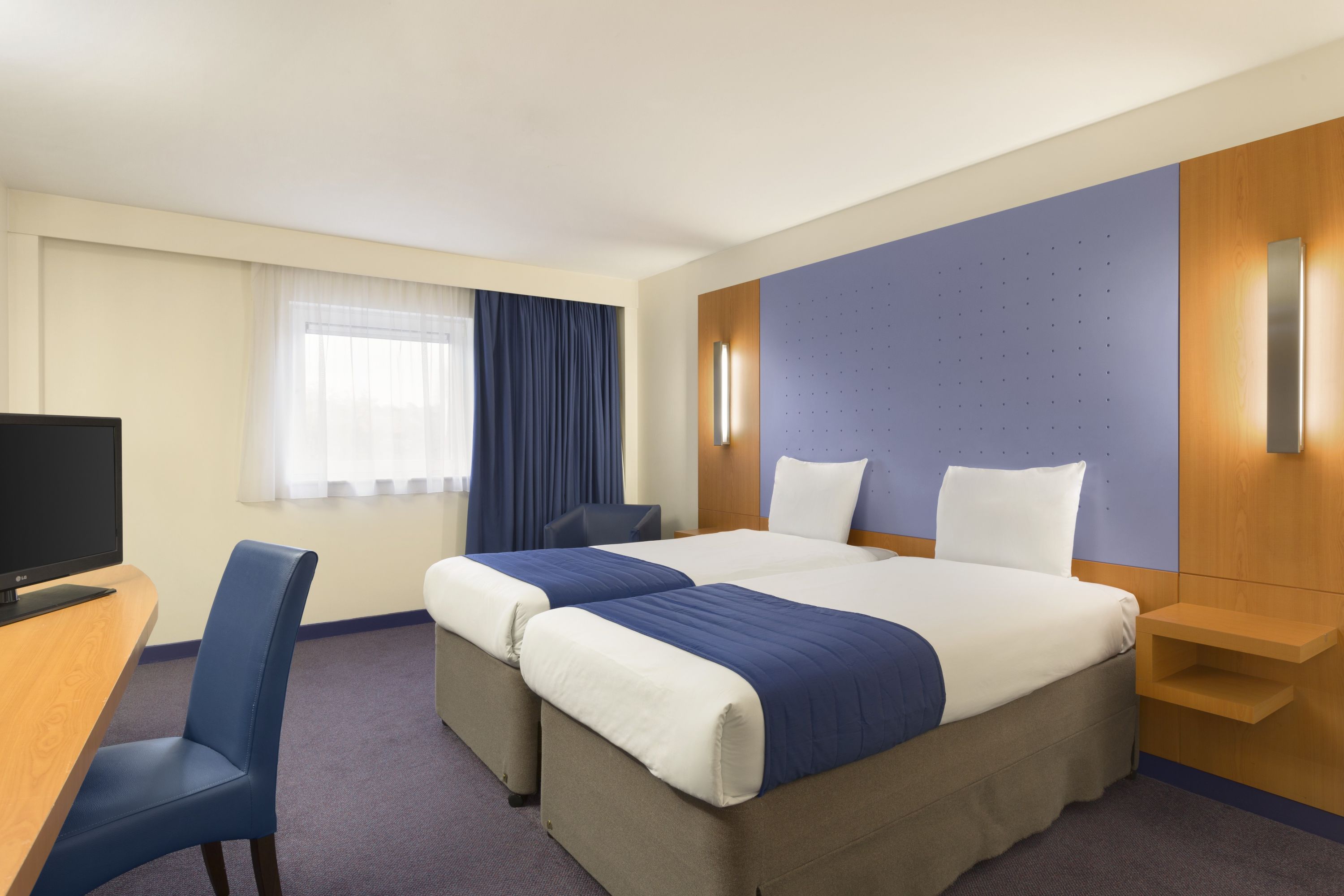 Guest room at the Ramada by Wyndham London North M1 in London, Other than US/Canada