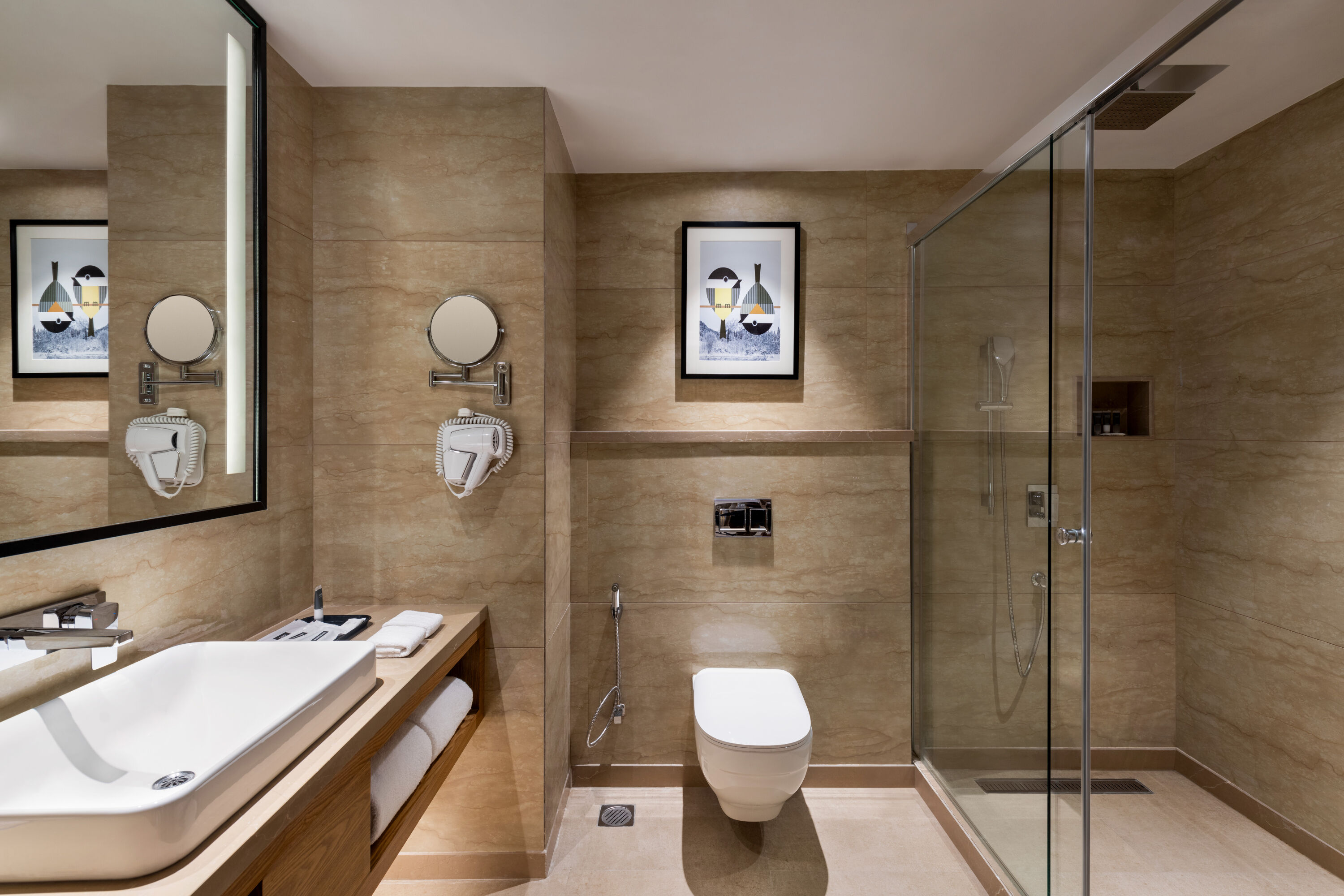 Guest room bath at the Ramada Encore by Wyndham Amritsar Airport in Amritsar, Other than US/Canada