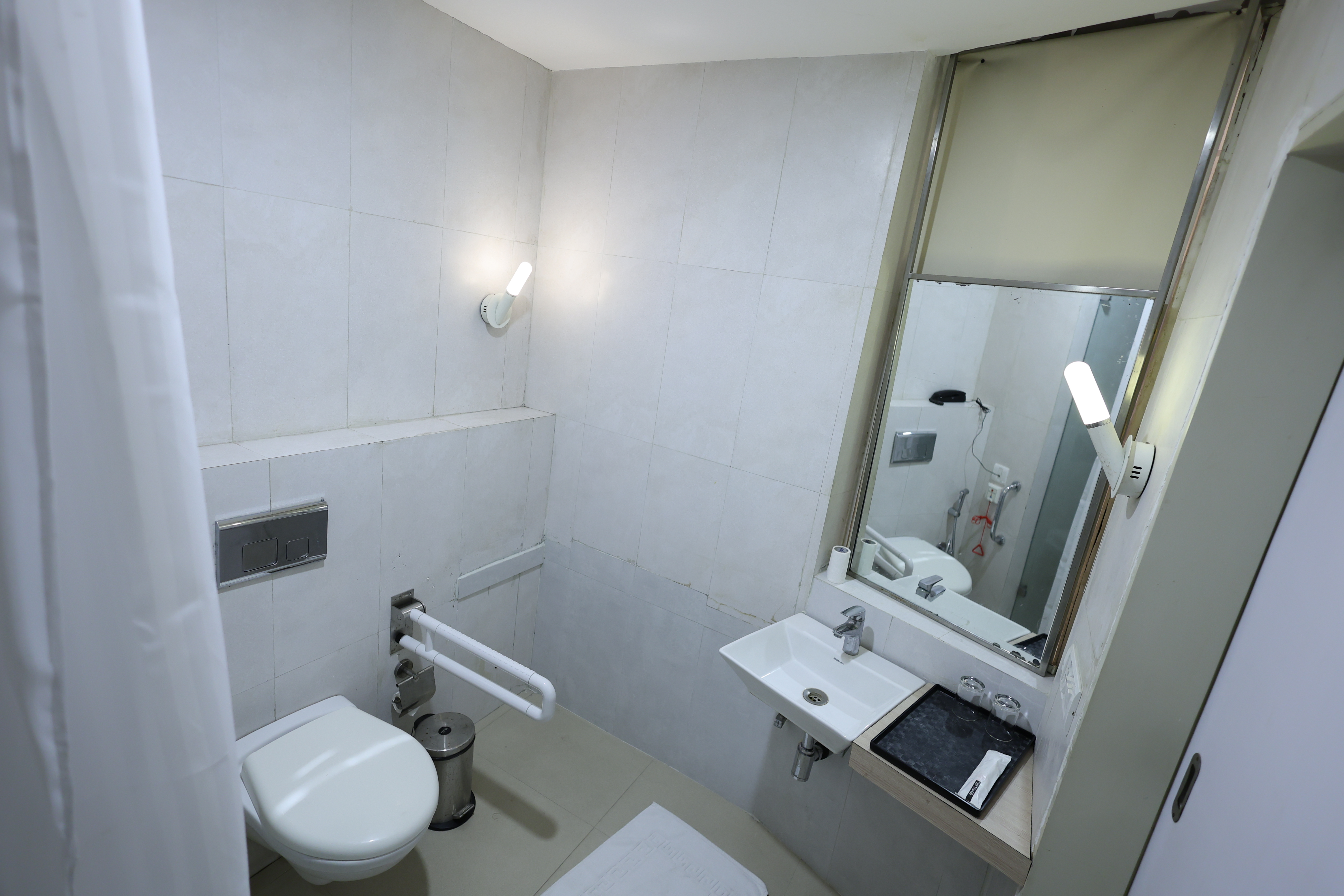 Guest room bath at the Ramada by Wyndham Bodh Gaya Mahabodhi in Bodh Gaya, Other than US/Canada