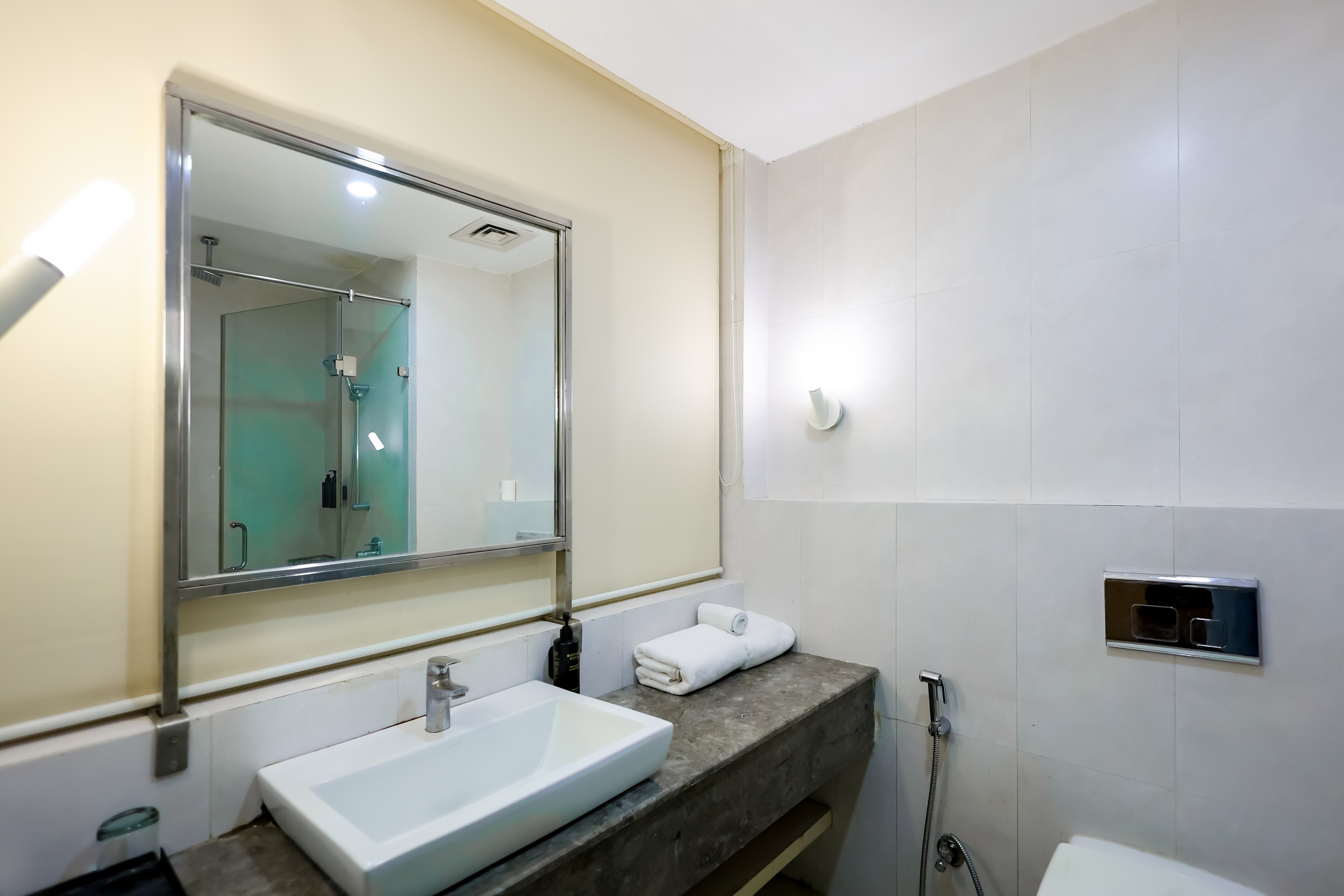 Guest room bath at the Ramada by Wyndham Bodh Gaya Mahabodhi in Bodh Gaya, Other than US/Canada