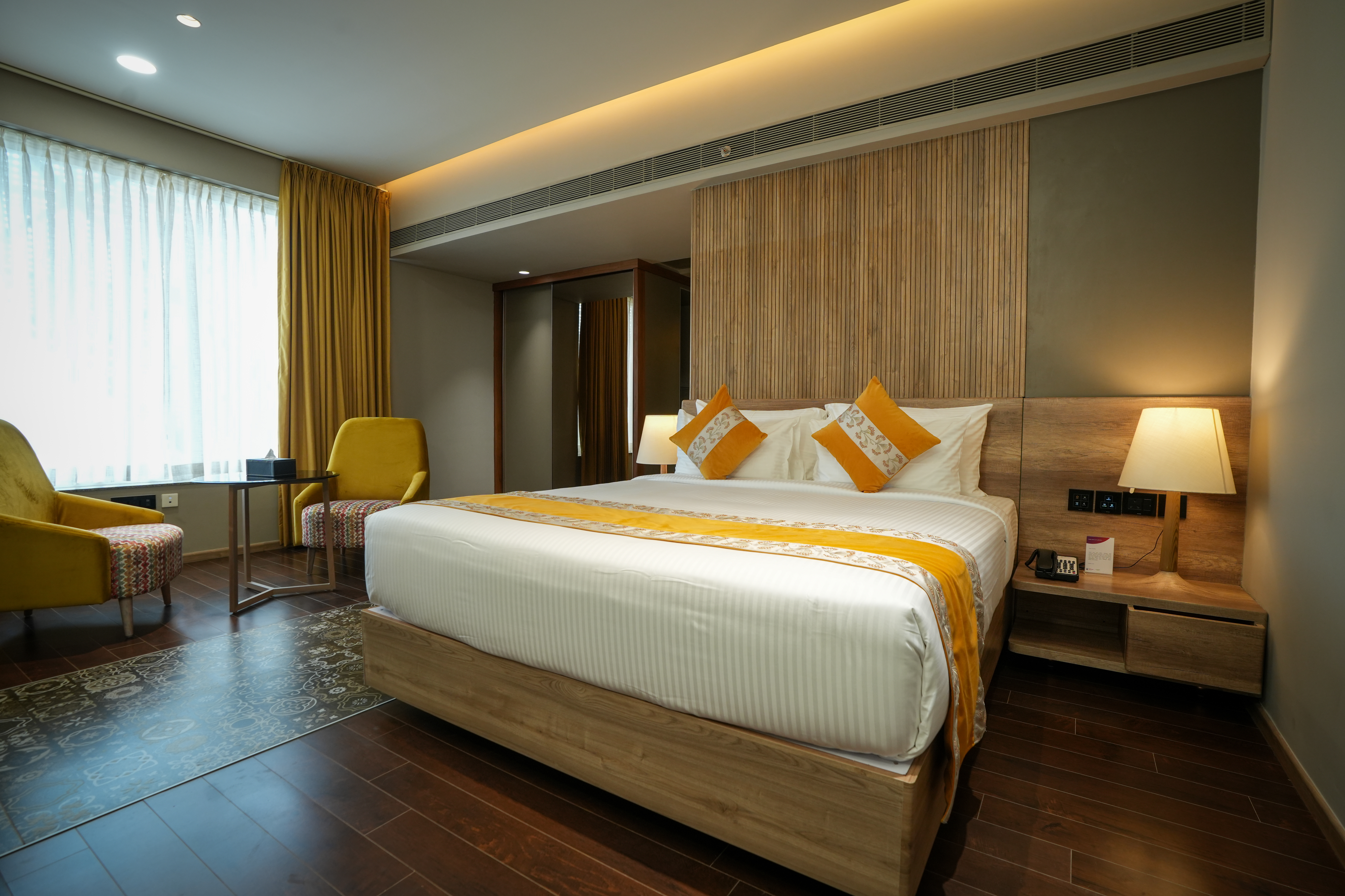 Guest room at the Ramada Encore by Wyndham Kochi Kalamassery in Cochin, Other than US/Canada