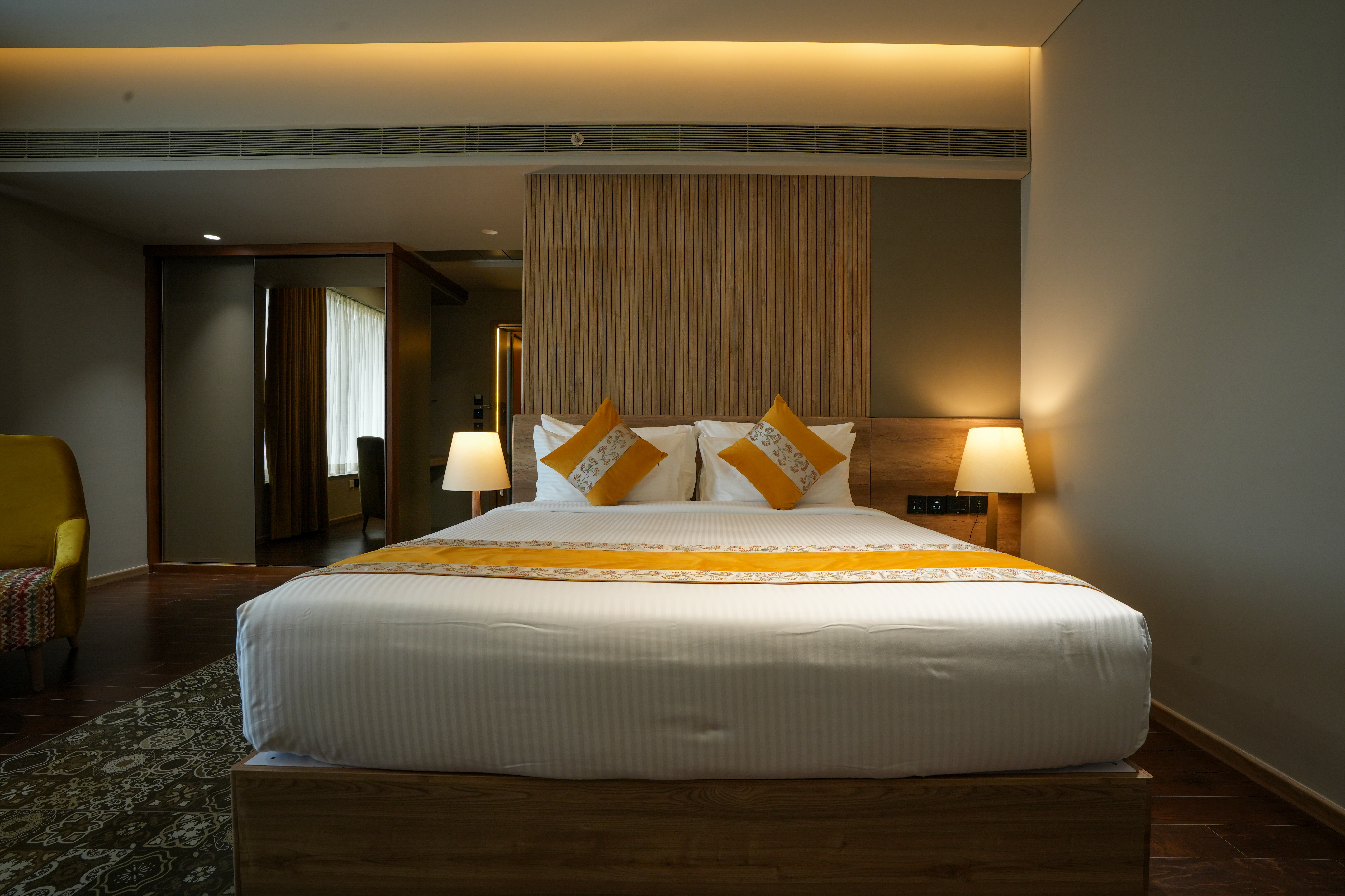 Guest room at the Ramada Encore by Wyndham Kochi Kalamassery in Cochin, Other than US/Canada
